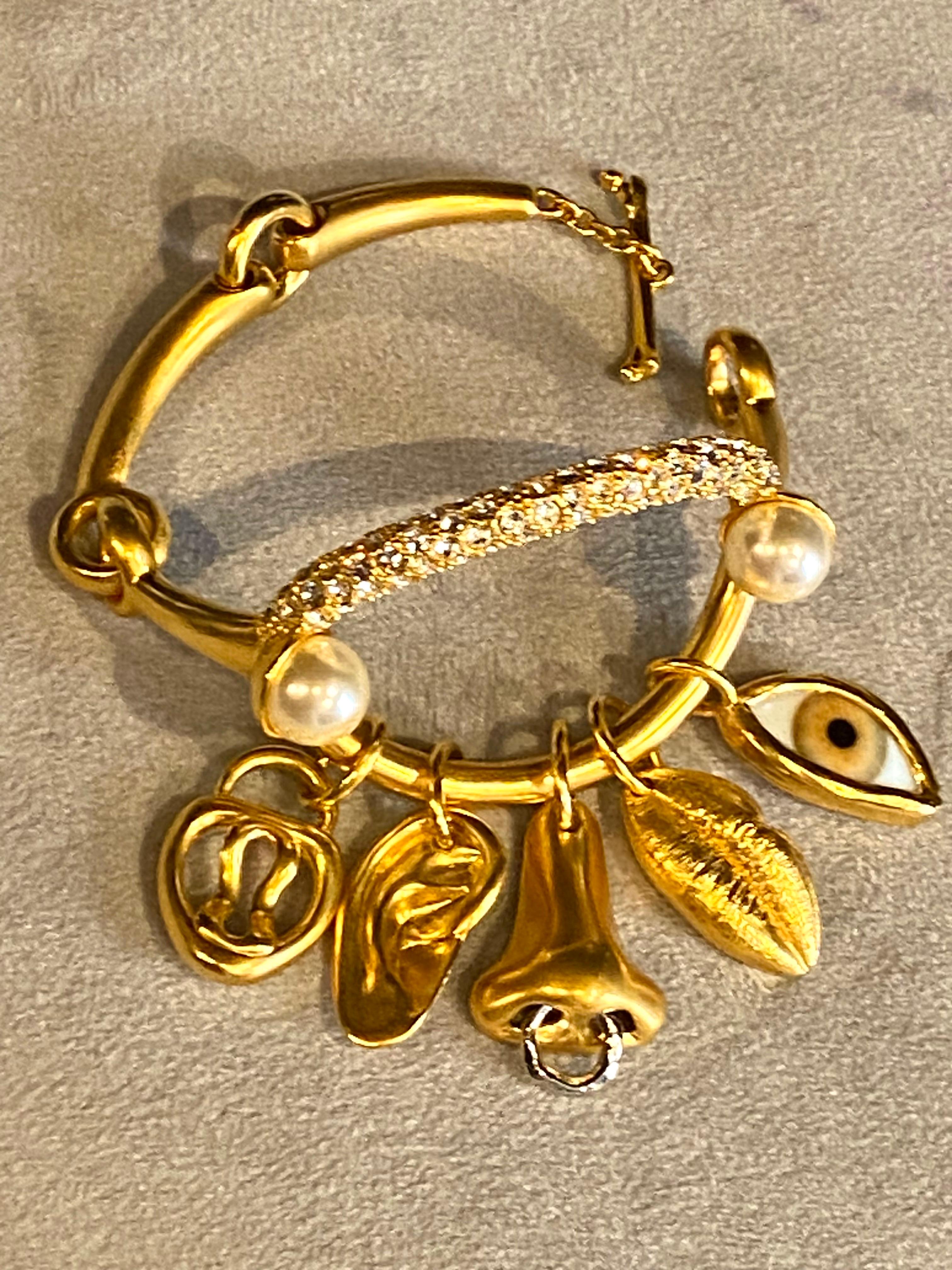 Contemporary Schiaparelli Satin Gold, Pearl & Rhinestone Iconic Surrealist Charm Bracelet For Sale