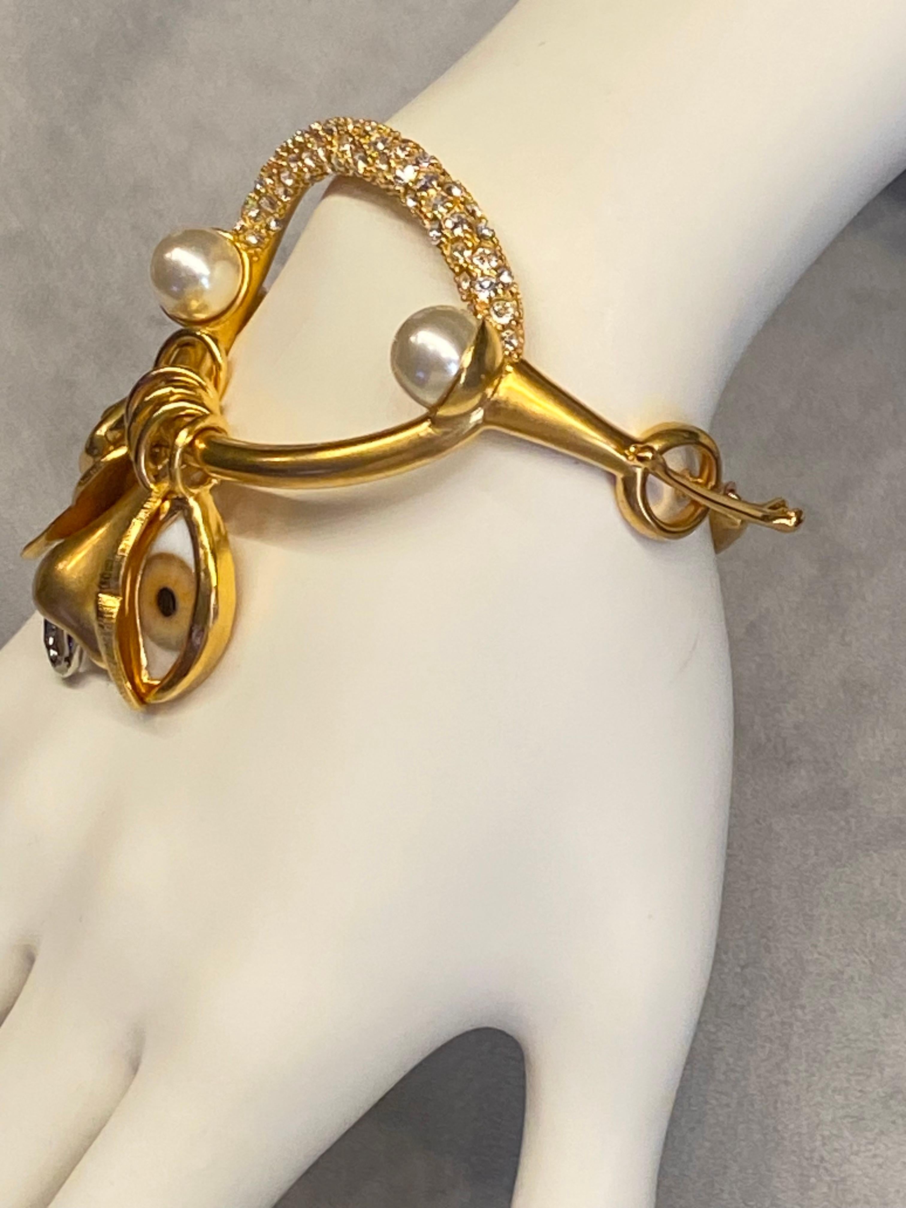 Women's or Men's Schiaparelli Satin Gold, Pearl & Rhinestone Iconic Surrealist Charm Bracelet For Sale