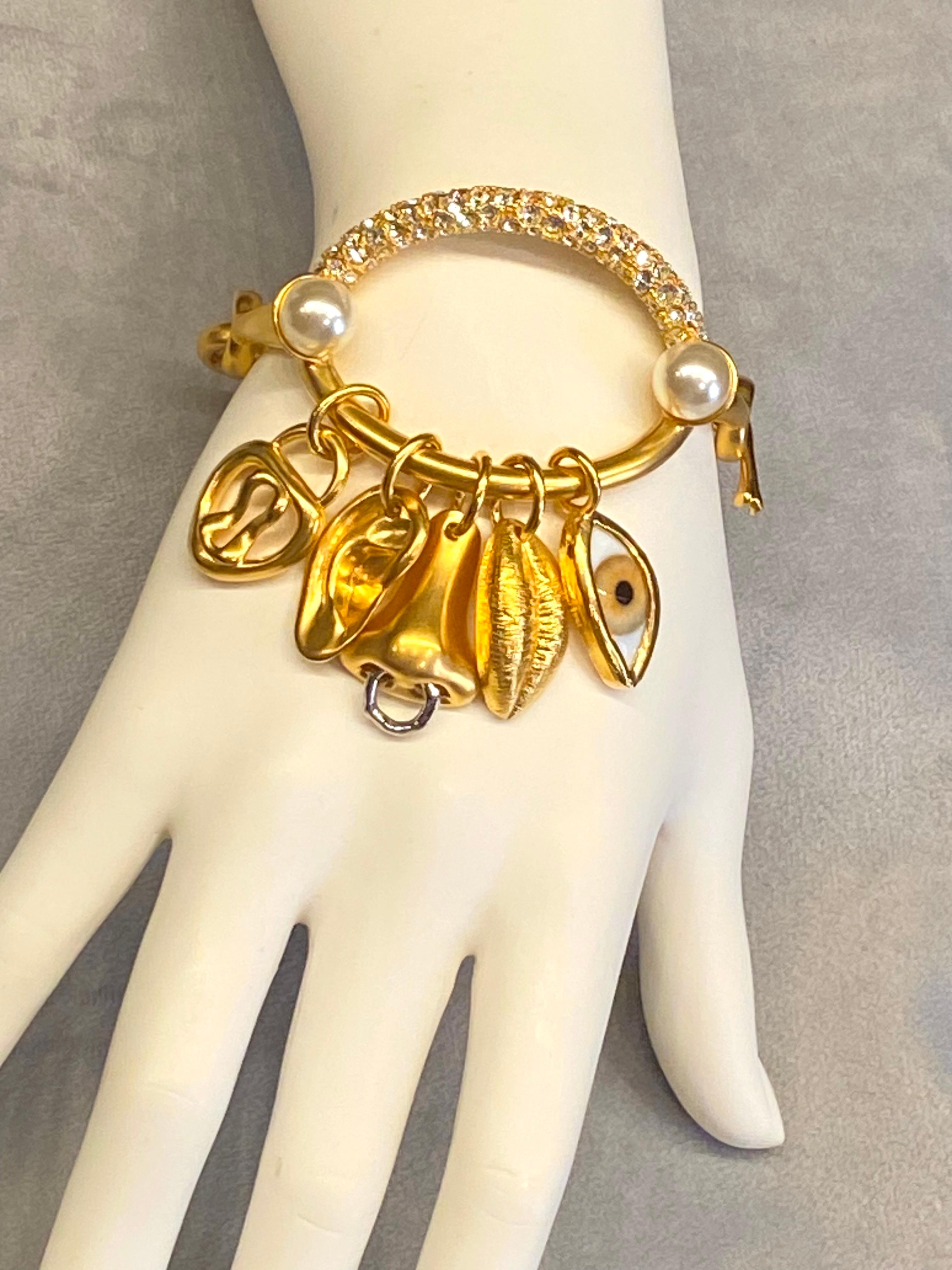 Schiaparelli Satin Gold, Pearl & Rhinestone Iconic Surrealist Charm Bracelet For Sale 1