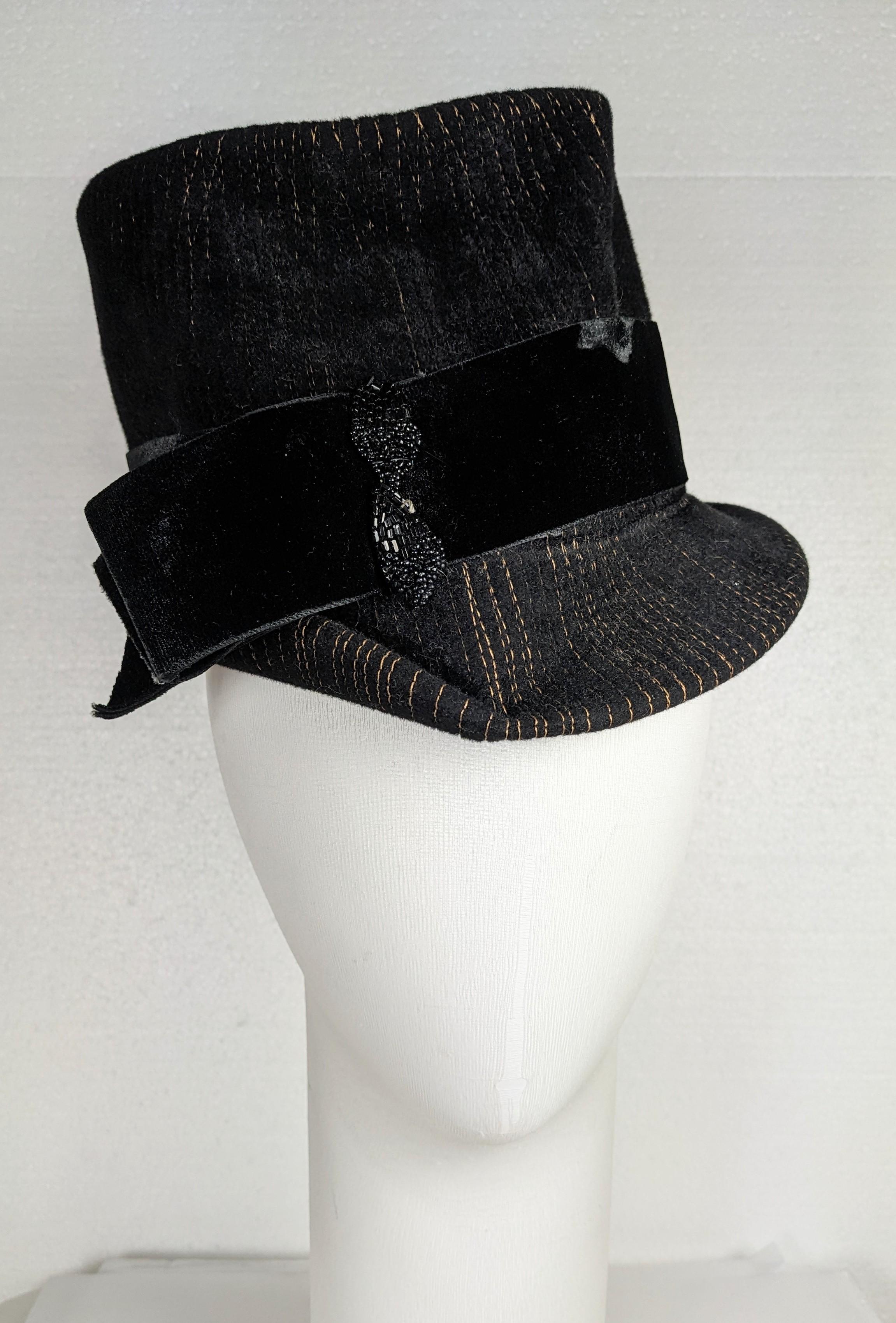 Schiaparelli's 1945 Talleyrand Silhouette revival stove pipe hat is a later 1950's  interpretation of her earlier design. When Schiaparelli returned to Paris, she presented her first postwar collection in September 1945 with the ‘Talleyrand’