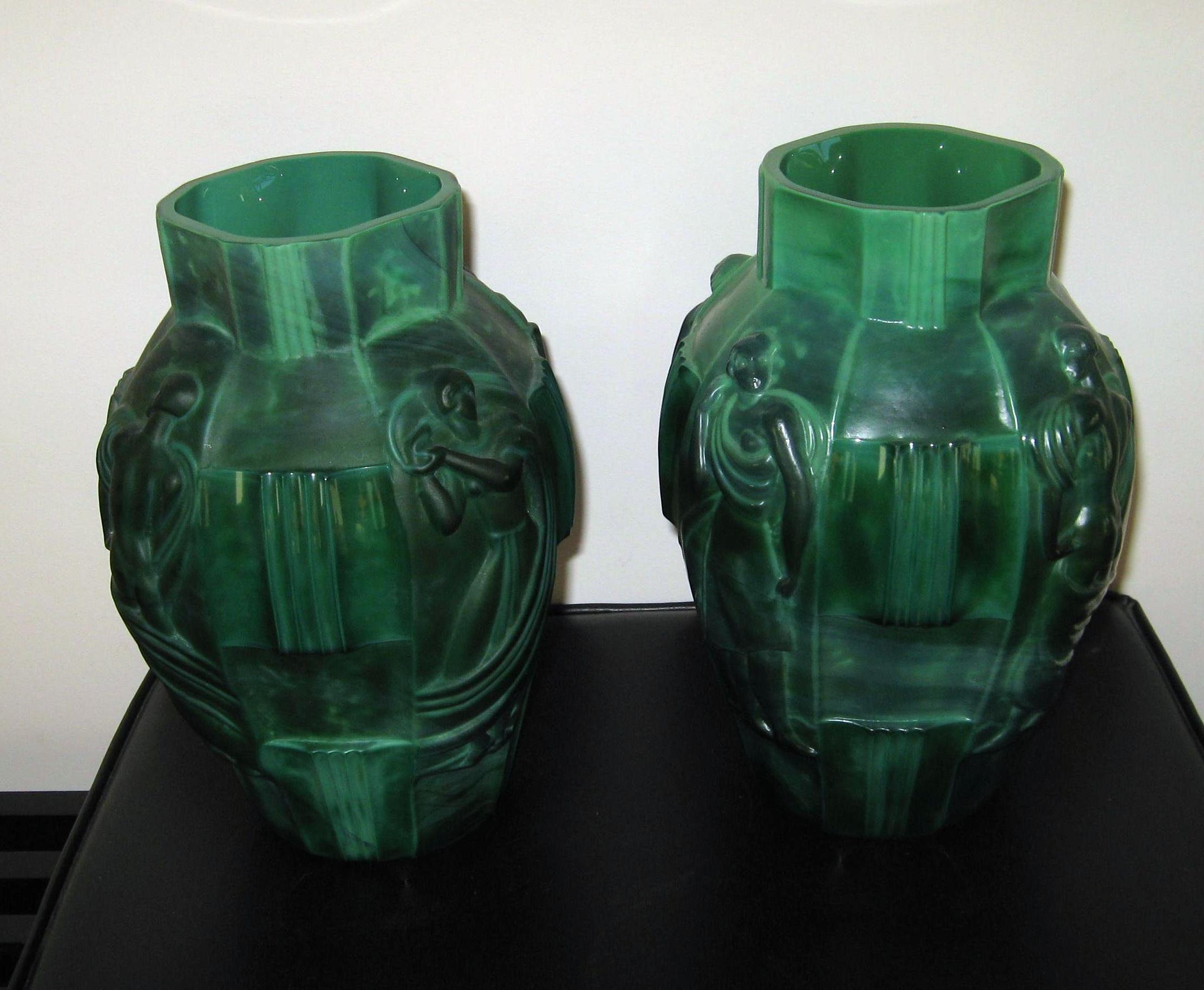 Pair of identical green Czech Moser Malachite glass vases by Schlevogt.
Called the “Ingrid Vases.” Created, circa 1930s.
In very good, vintage condition- no chips, cracks or major scratches.
Pattern depicts four women in various poses separated