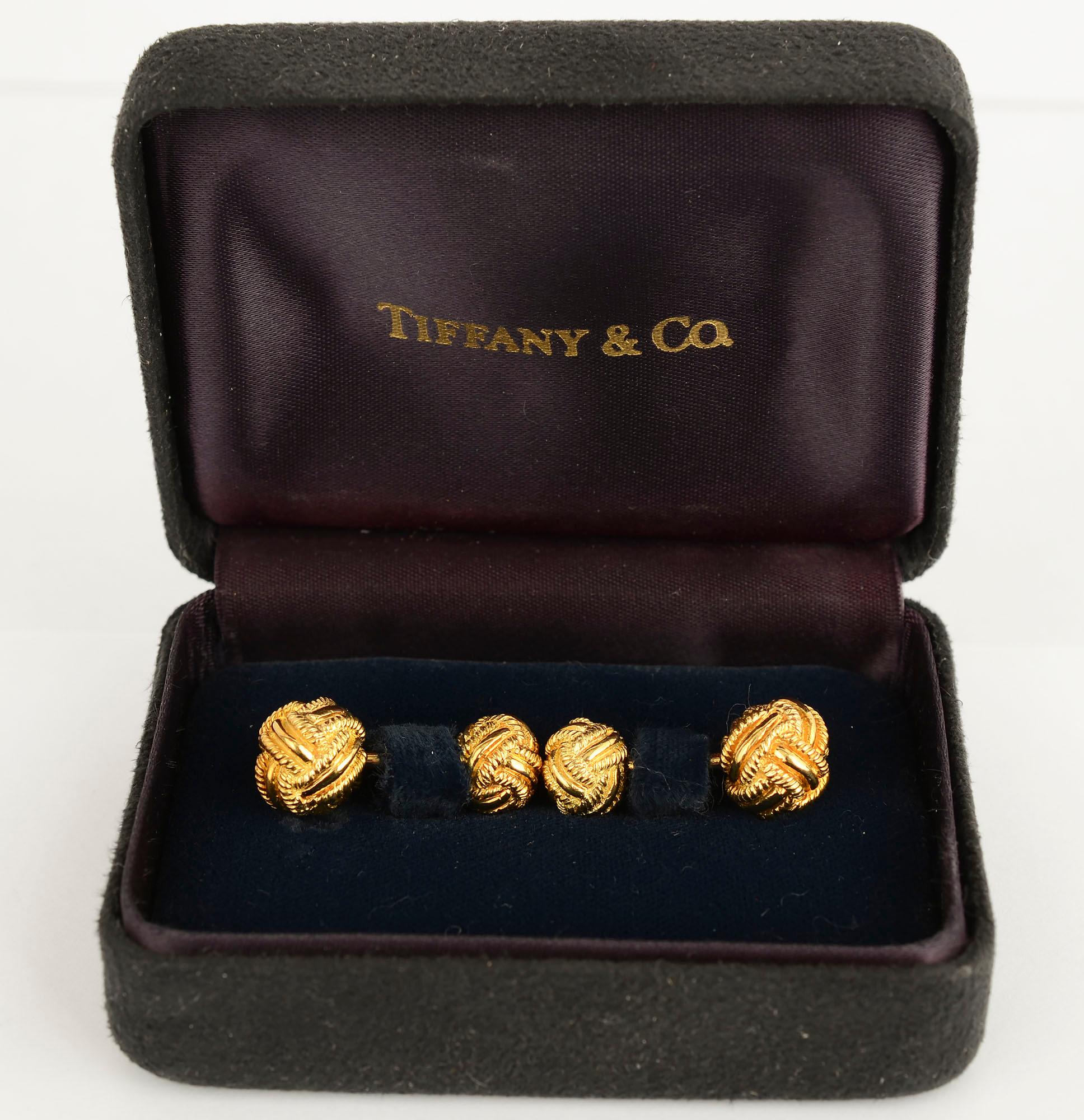 Schlumberger for Tiffany elegant gold knot cufflinks. Smooth strands of gold alternate with twisted gold to create each ball. The larger ball is 3/8