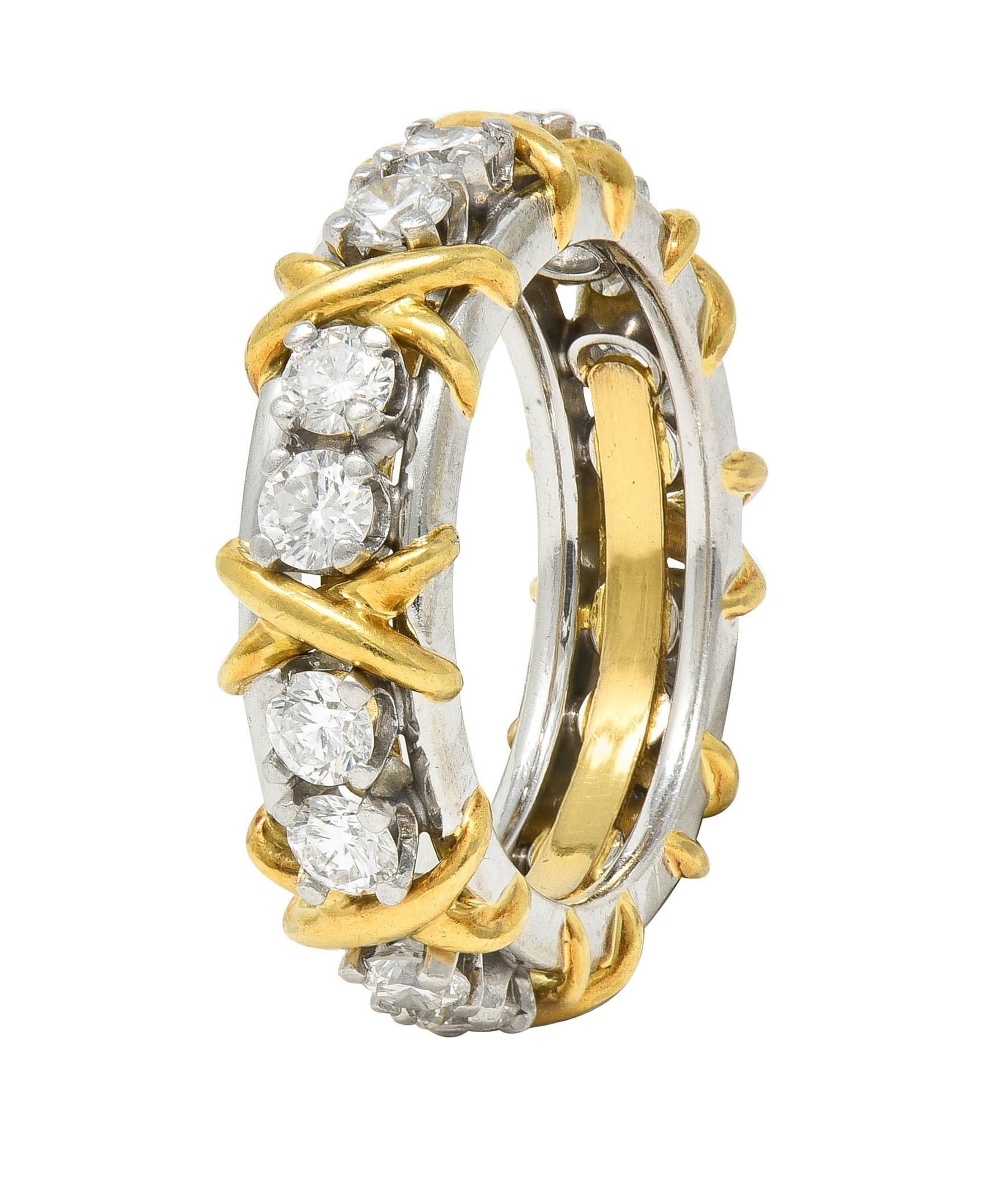 Designed as a platinum band with yellow gold 