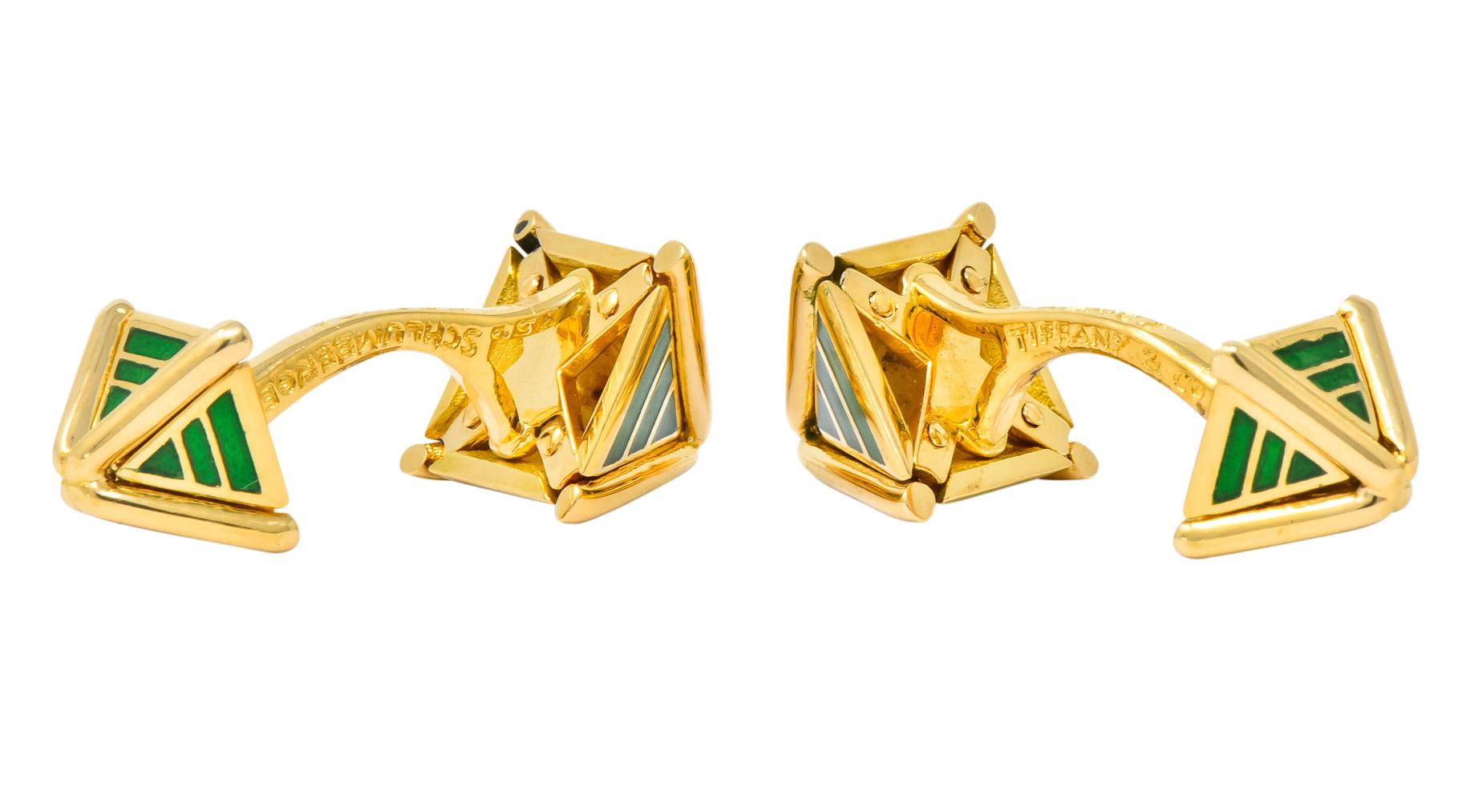 Fixed back style cufflinks with each end as a hollow pyramid, one side larger than the other

Featuring green enamel stripes 

Fully signed Schlumberger, Tiffany & Co. France

Stamped 750 with French assay marks for 18 karat gold

Length: approx. 1