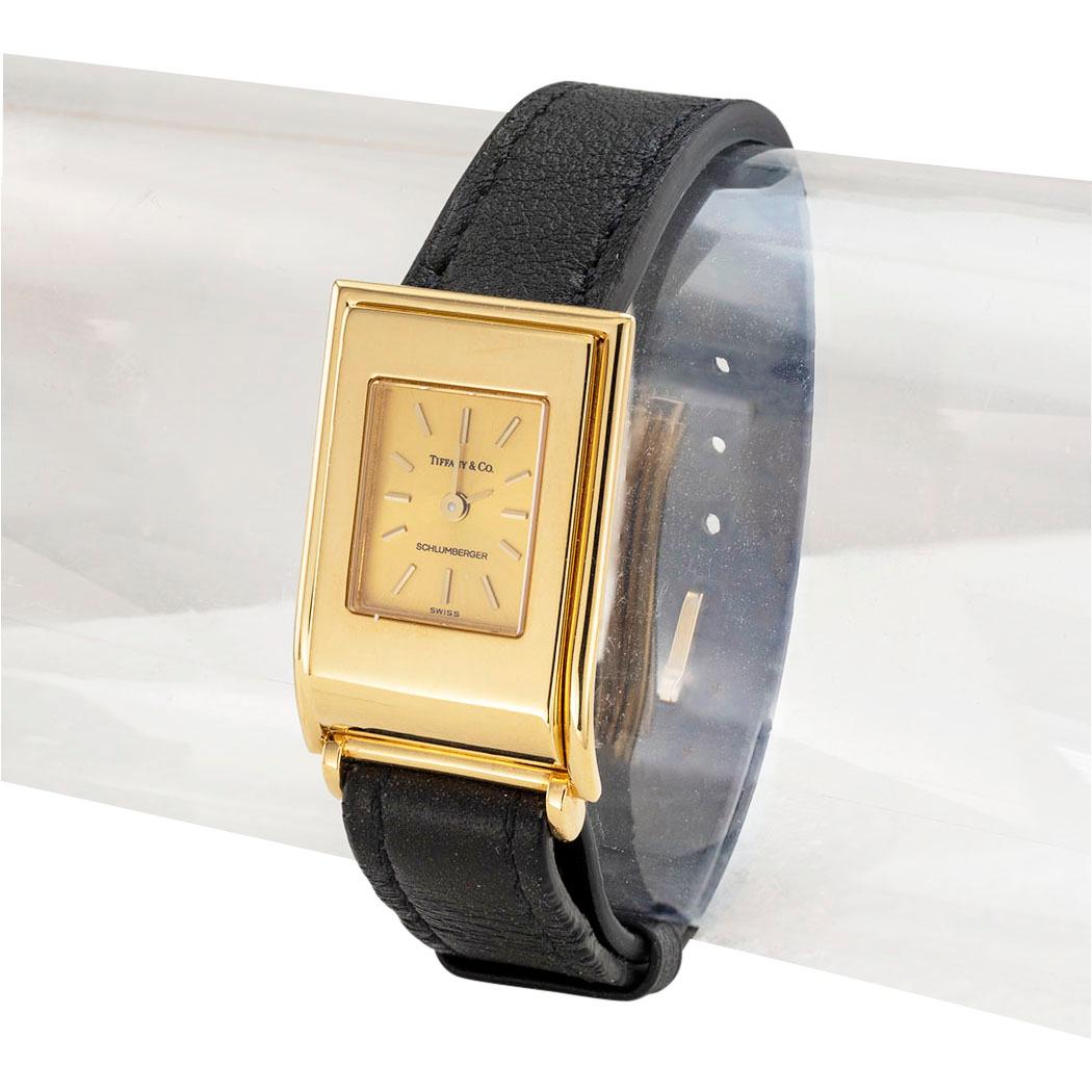 Schlumberger Tiffany & Co yellow gold quartz wristwatch circa 1990.  Clear and concise information you want to know is listed below.  Contact us right away if you have additional questions.  We are here to connect you with beautiful and affordable