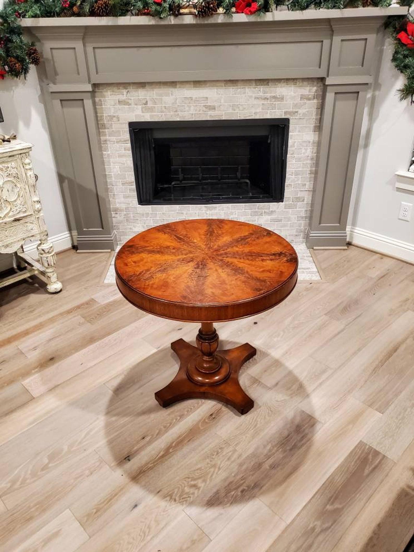 A stunning Schmieg & Kotzian signed mahogany inlaid table from the first half of the 20th century. Exceptionally hand-crafted, fine quality craftsmanship, detailing and solid wooden construction. 

The exquisite American table, circa 1930,