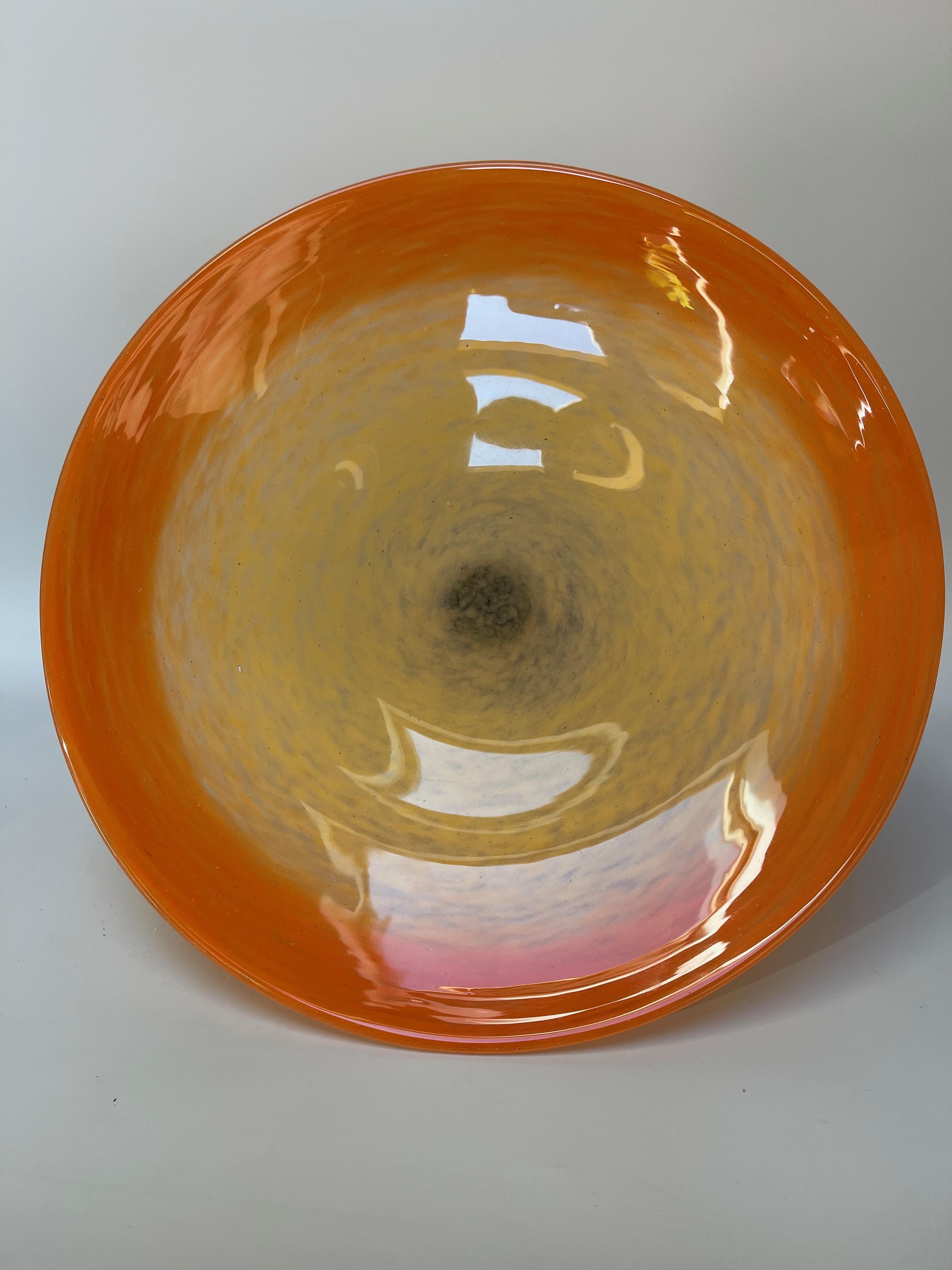 Schneider orange tango and yellow bowl on a wrought iron base with 3 coloured glass balls.
Signed 