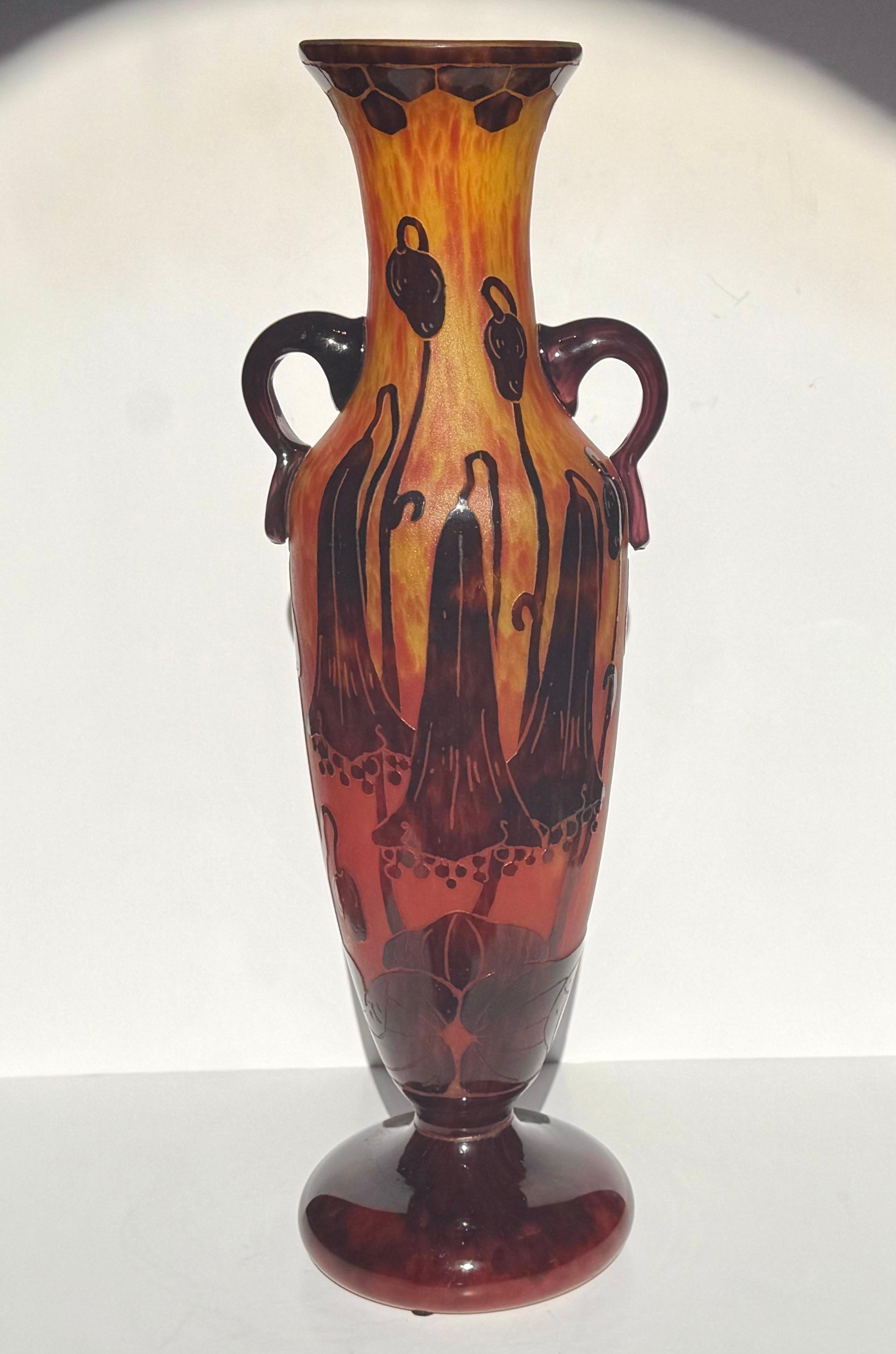 A Tall Le Verre Francaise Schneider Art Nouveau Two Handled Cameo Vase with Bell Flowers in Orange, Red and Yellow.
France
Circa. 1925,  
Incised mark 