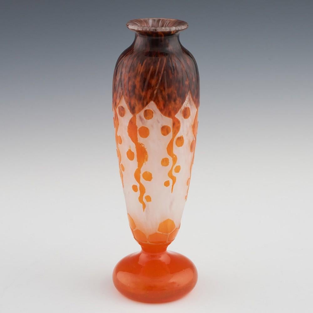 Heading : Schneider Rubaniers vase
Date : c1925
Origin : Epinay-sur-Seine, France
Bowl Features : Mottled brown, white, and orange glass depicting stylised ribons of foliage
Marks : Signed Le Verre Francais to the upper foot
Type : Lead
Size :