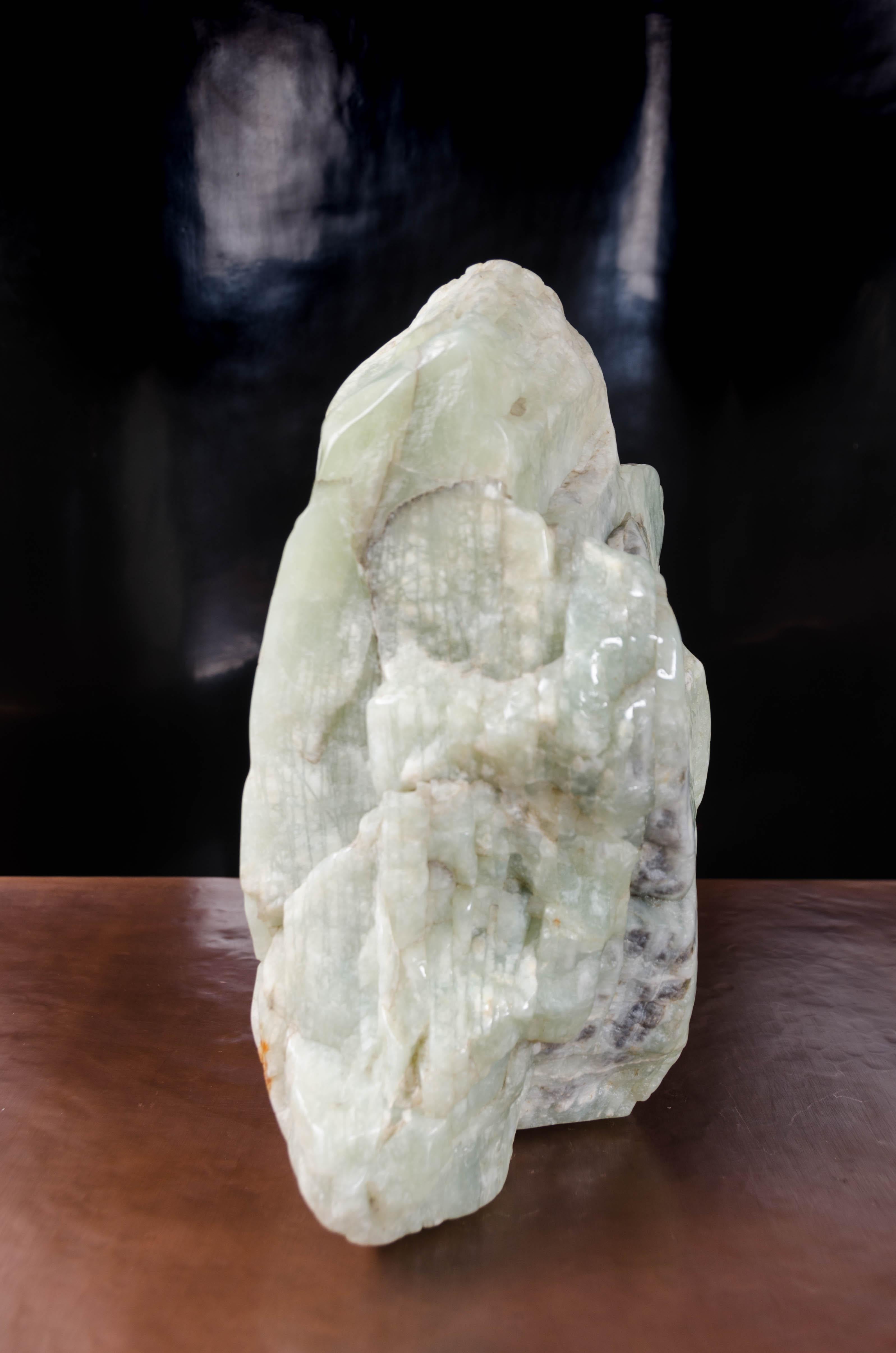 Scholar rock
Nephrite jade
Hand carved
Limited edition
Each piece is individually crafted and is unique. Jade color, size, shape and inclusions all vary.

Known as the “Stone of Heaven,” Nephrite Jade is prized for both its aesthetic beauty