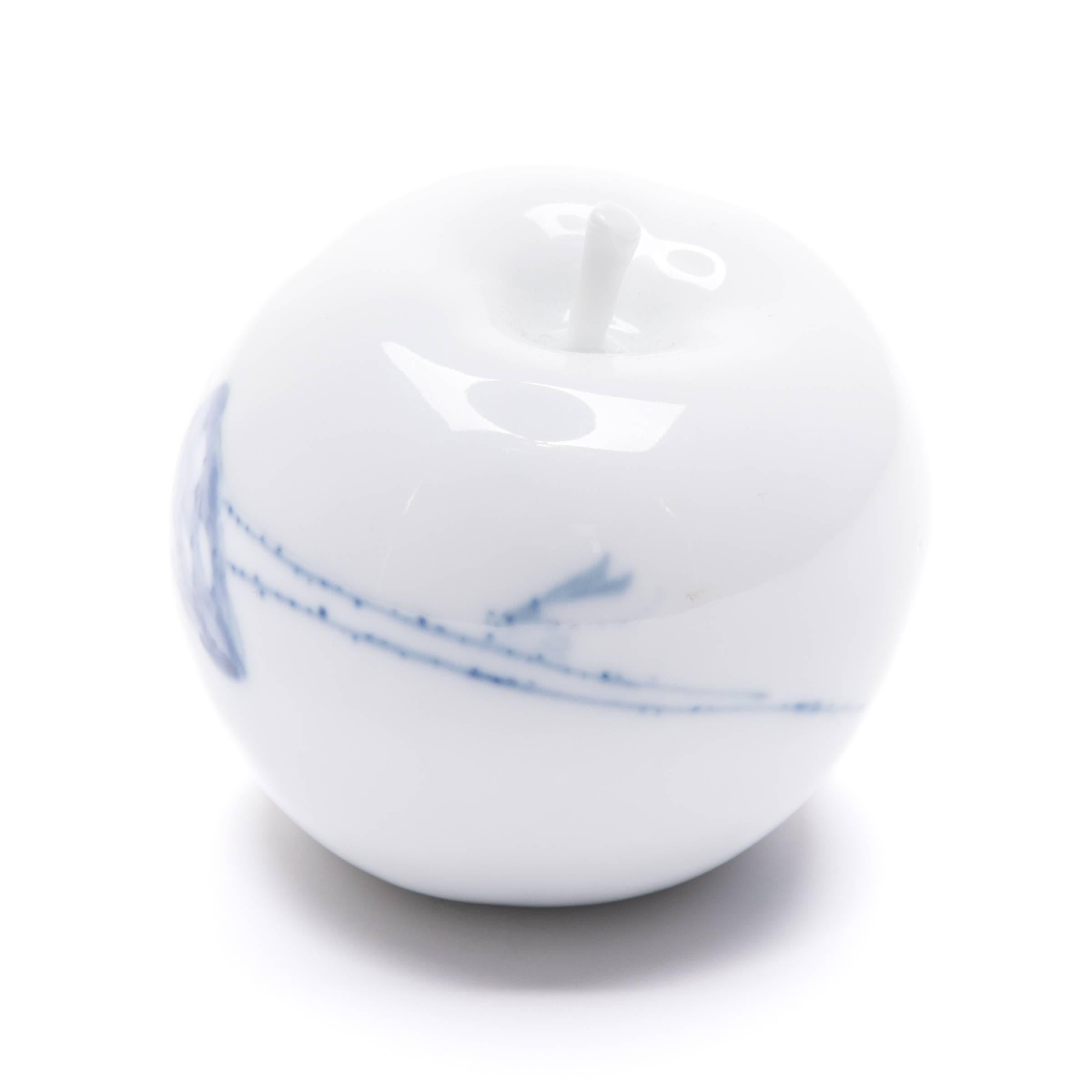 Created by artist Taikkun Li exclusively for PAGODA RED, this limited edition hand-painted porcelain apple is one of a series drawing on the rich tradition of Chinese blue-and-white ceramics. Fired at the historic Chinese imperial kilns of