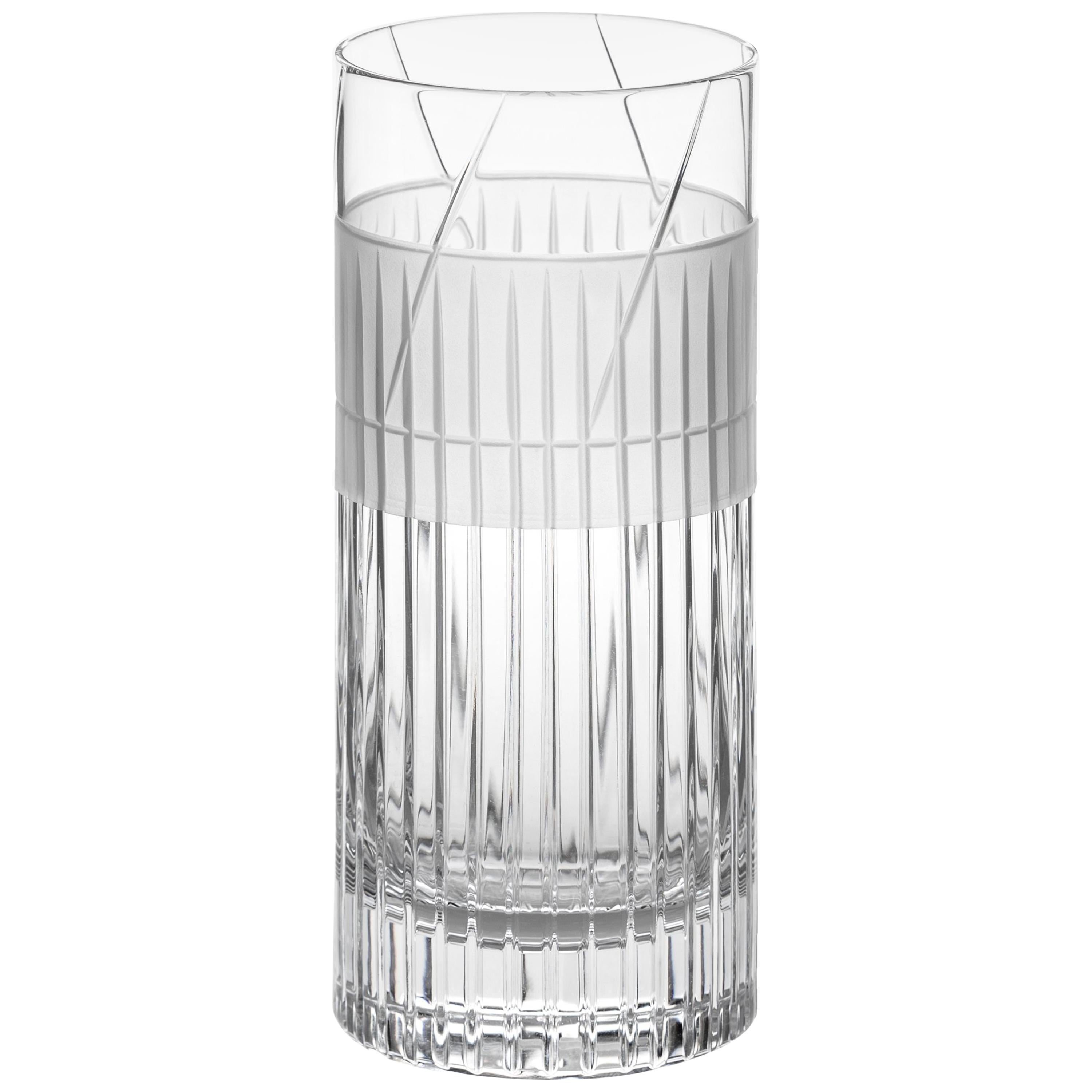 A high glass made by hand
A glass designed by Scholten & Baijings as part of our 'ELEMENTS' series.

The Collection: Elements
A rich canon of graphic markings defines the ELEMENTS series of lead crystal. Cuts and textures of varying depth and