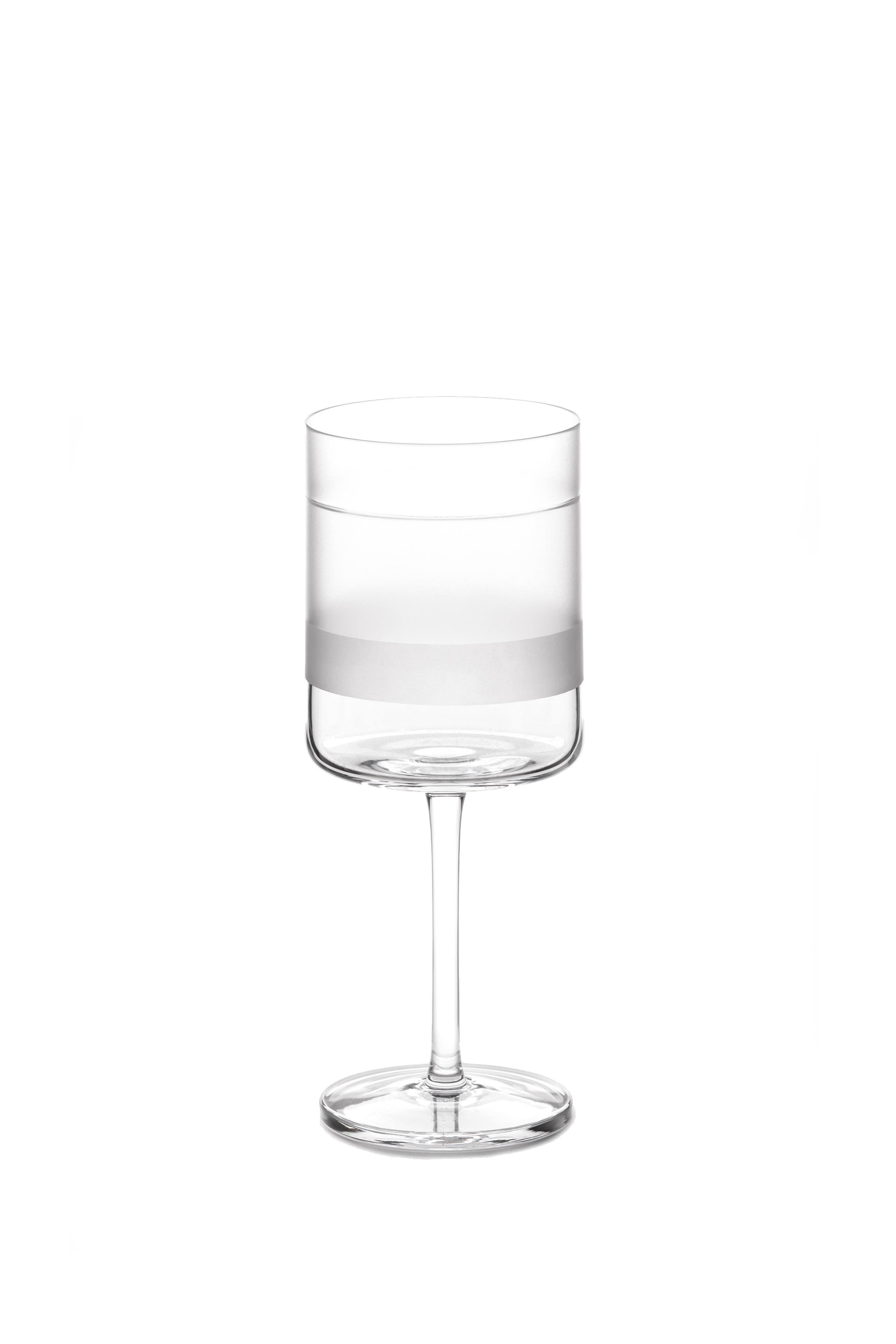 A red wine glass made by hand
A glass designed by Scholten & Baijings as part of our 'ELEMENTS' series.

The Collection: Elements
A depth of graphic markings defines the ELEMENTS series of lead crystal. Cuts and textures of varying depth and