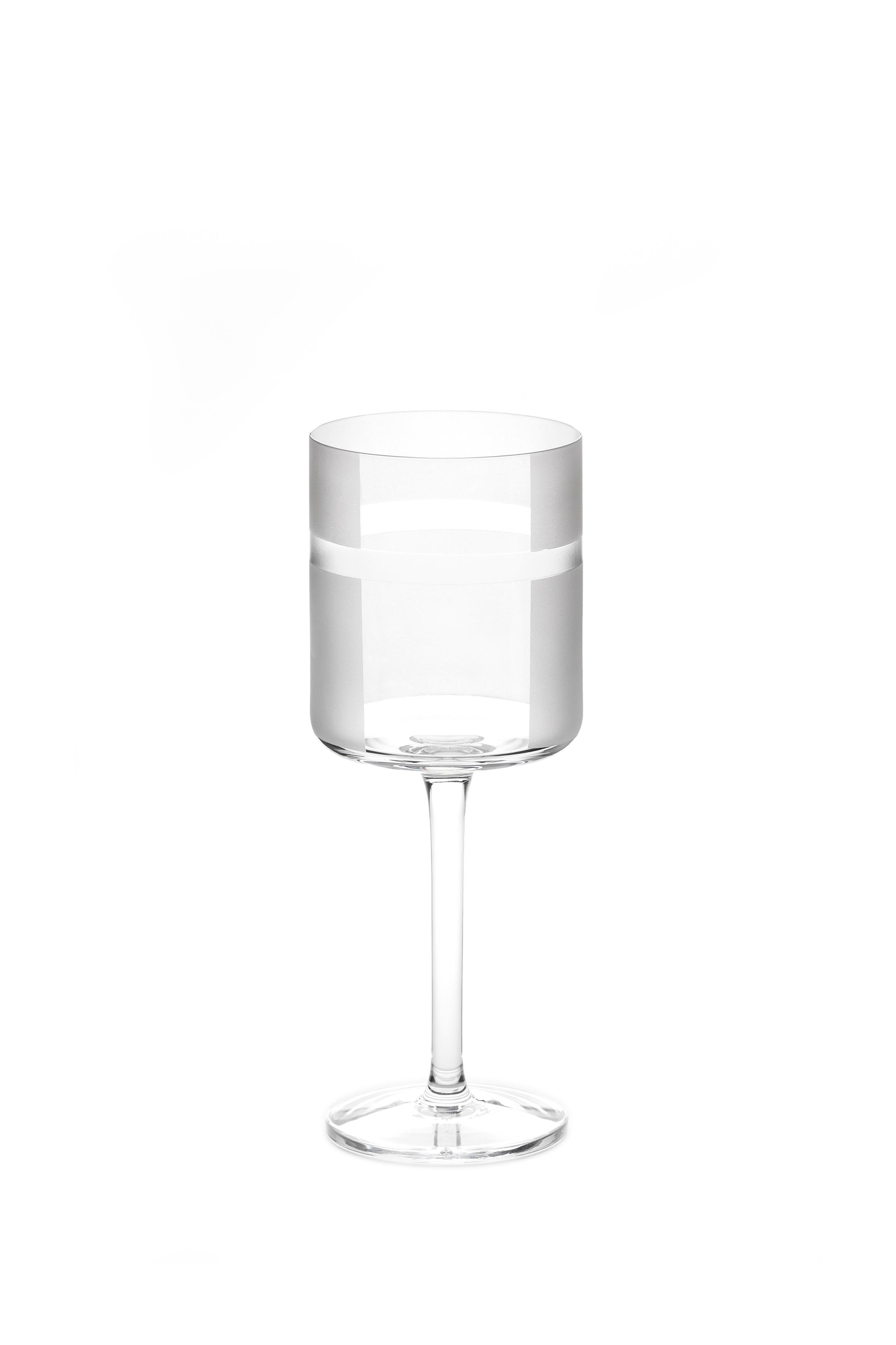 A white wine glass made by hand
A glass designed by Scholten & Baijings as part of our 'ELEMENTS' series.

The Collection: Elements
A rich canon of graphic markings defines the ELEMENTS series of lead crystal. Cuts and textures of varying depth
