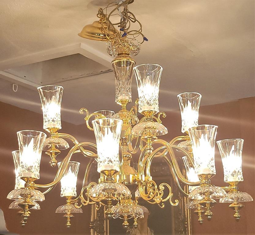 Presenting a gorgeous Swarofski/Schonbek gold and crystal 12 branch chandelier.

Late 20th century, circa 1970-80.

Has it’s original label for ‘Luminaire’ a high end Canadian lighting company who specialized in Swarofski Schonbek Chandelier in