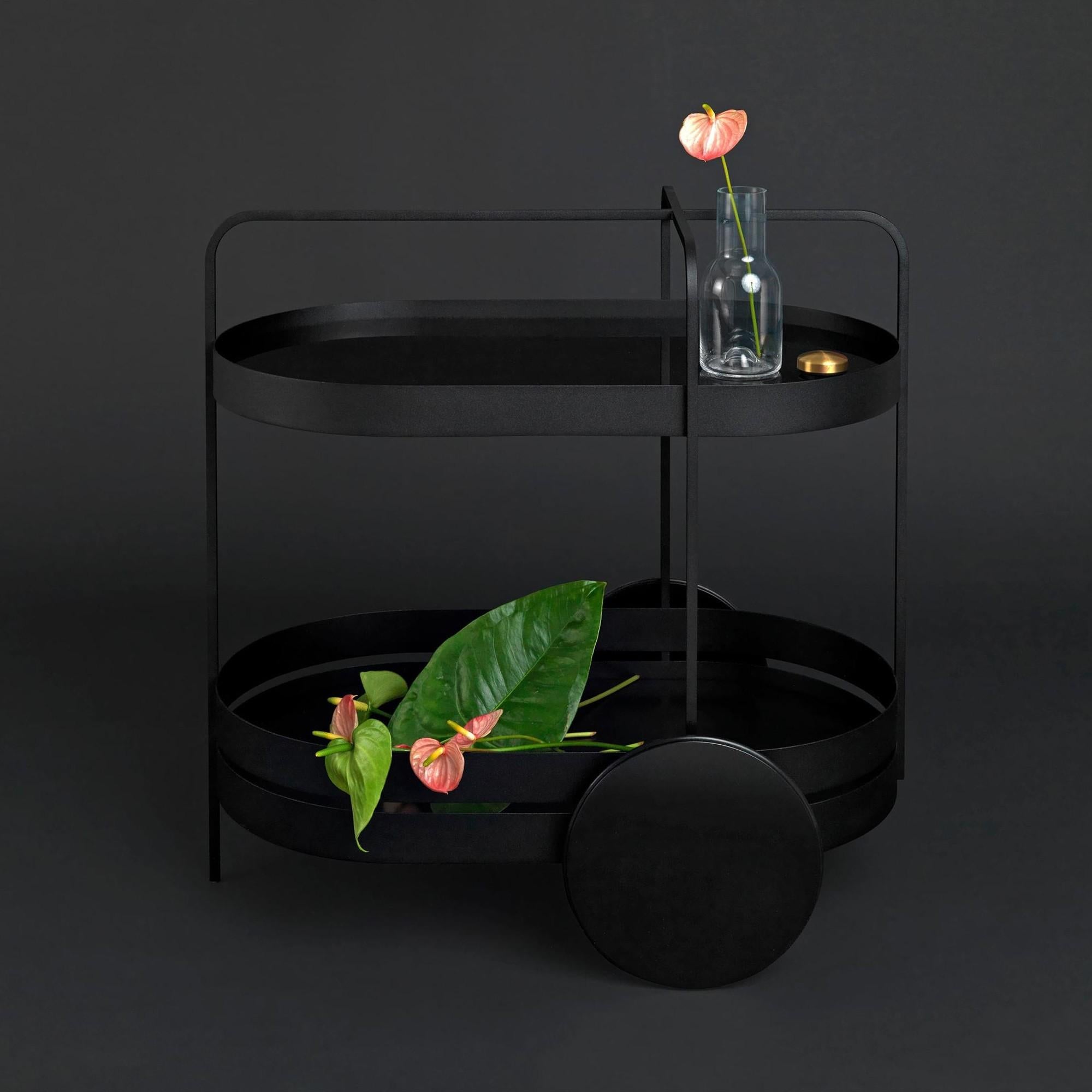 A future Classic. The clear lines and stylish practicality of the grace serving trolley make for a winning combination. Its Minimalist form is the perfect modern twist on a Classic item. Use as a mobile bar or side table, or for storage in home