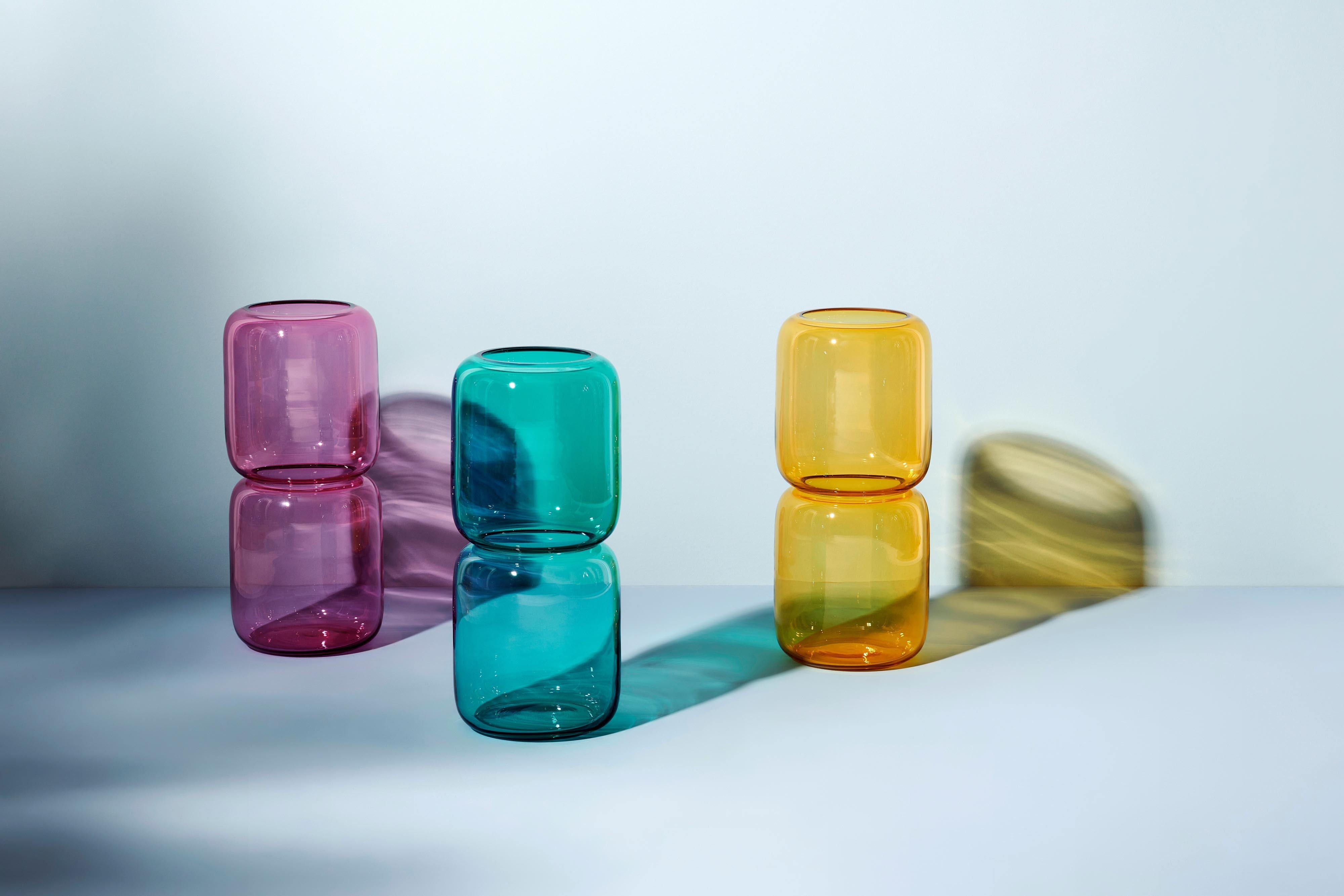 The SARO umbrella Stand turns glass into something truly special. The hourglass-like shape and semi-transparent hues make it an eye-catching piece for entrance areas. It comes in a range of colours, from pine green or cloudy grey to lavender,