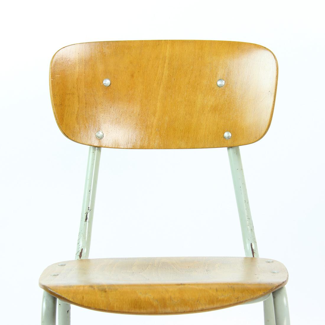 Great vintage find with a lot of history. This school chair was mass produced for schoold in Czechoslovakia in 1960y and has been in use until 90s. The construction is made of bent steel tubes in gry color. The seat and backrest are made of bent