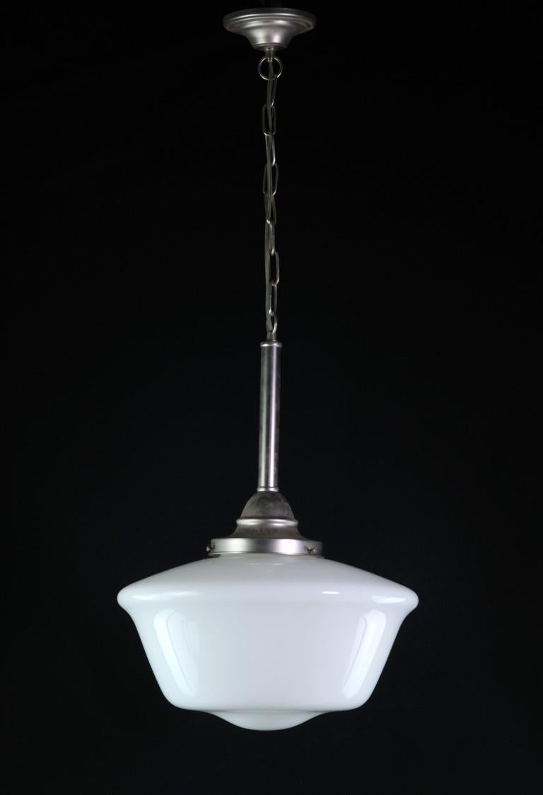 1940s pendant light featuring a white opaline glass shade. Comes with new wired brushed steel hardware. Please note, this item is located in our Scranton, PA location.