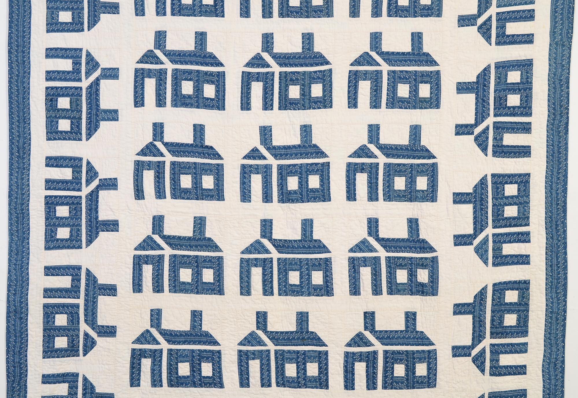The Schoolhouse is one of America's favourite quilt patterns. This fine example is well designed with houses at right angles framing the primary group. It's interesting that the bottom row can be seen as either part of the vertical grouping or a