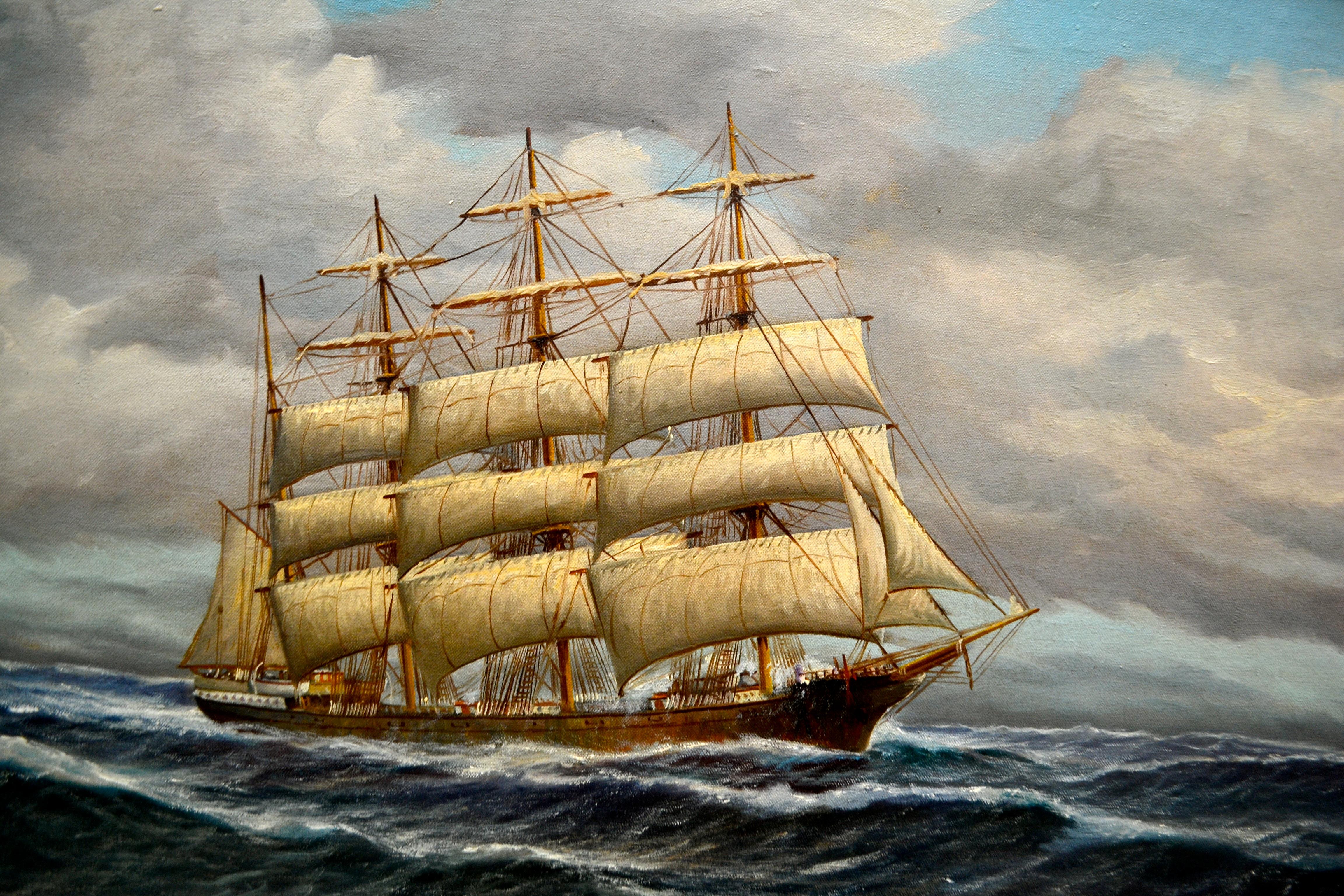 A Classic marine painting (oil on canvas) of a three masted schooner under full sail in choppy seas and a blue and cumulus cloud filled sky. Signed A.Gabali at the lower right hand corner of the canvas. The painting is set in a fully restored period