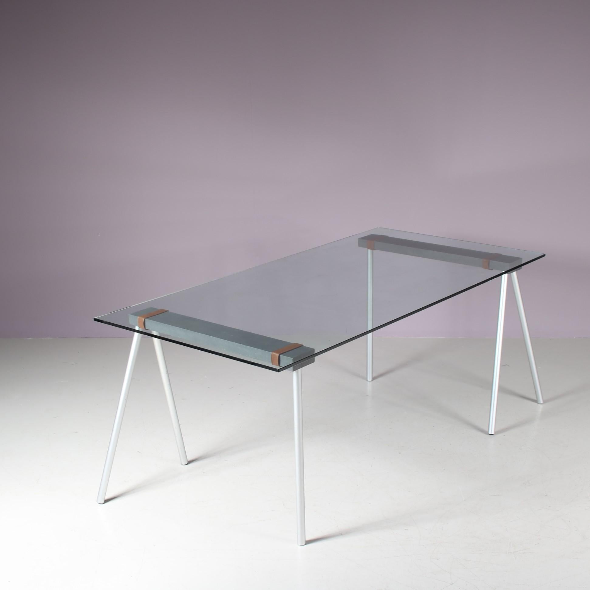 A beautiful “Schraag” (Dutch for “Trestle”) table designed by Maarten van Severen and manufactured by Bulo in Belgium around 2000.

This modern table is an unique and elegant piece of Belgian design. The trestles can be folded for easy