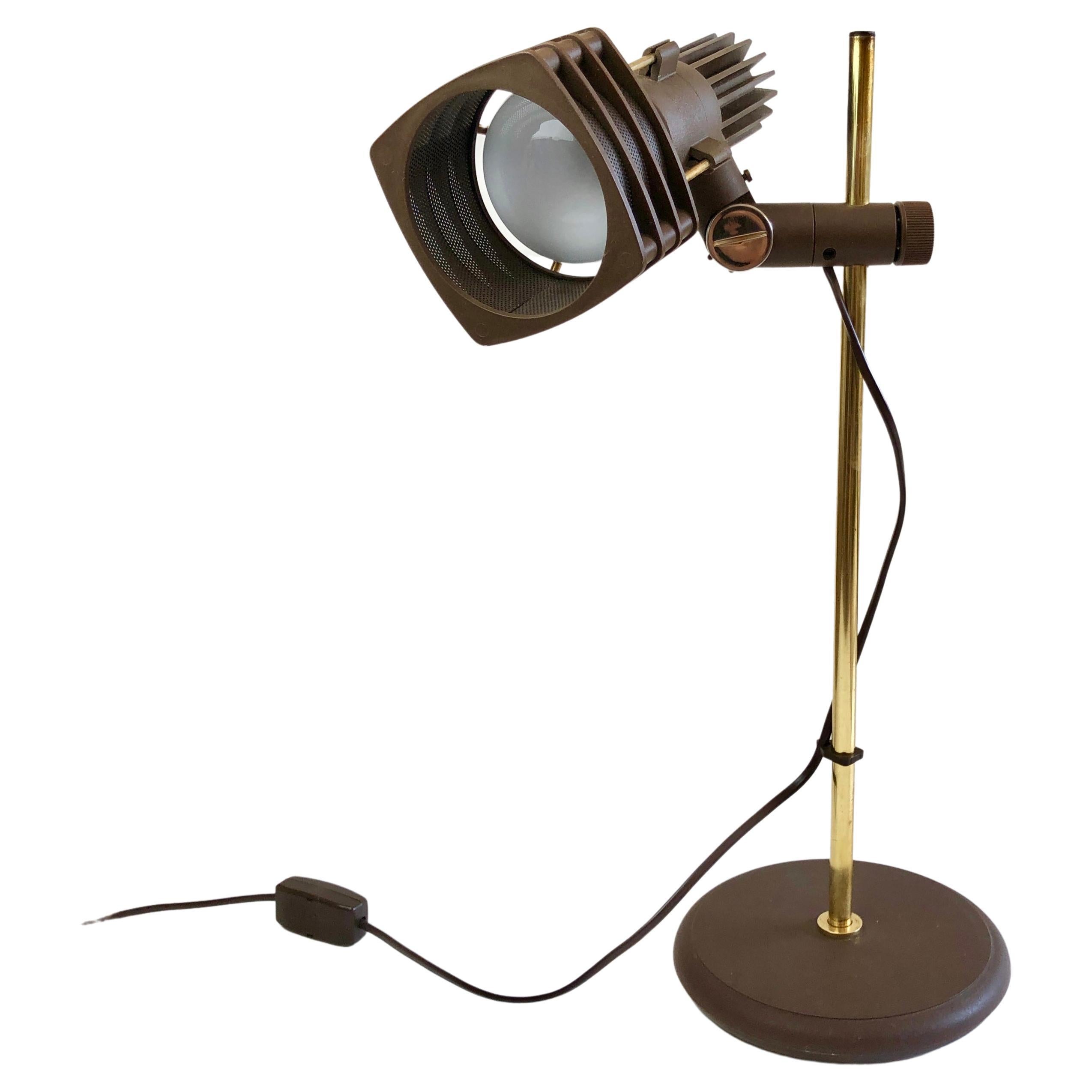 Mid-Century desk lamp – made in Spain, attributed to Fase.
A genuine 70s lamp, in original, beautiful condition.

Made from dark brown plastic with a 'rugged' finish & brass coloured metal.
The square lamp shade can be moved up- and downwards by