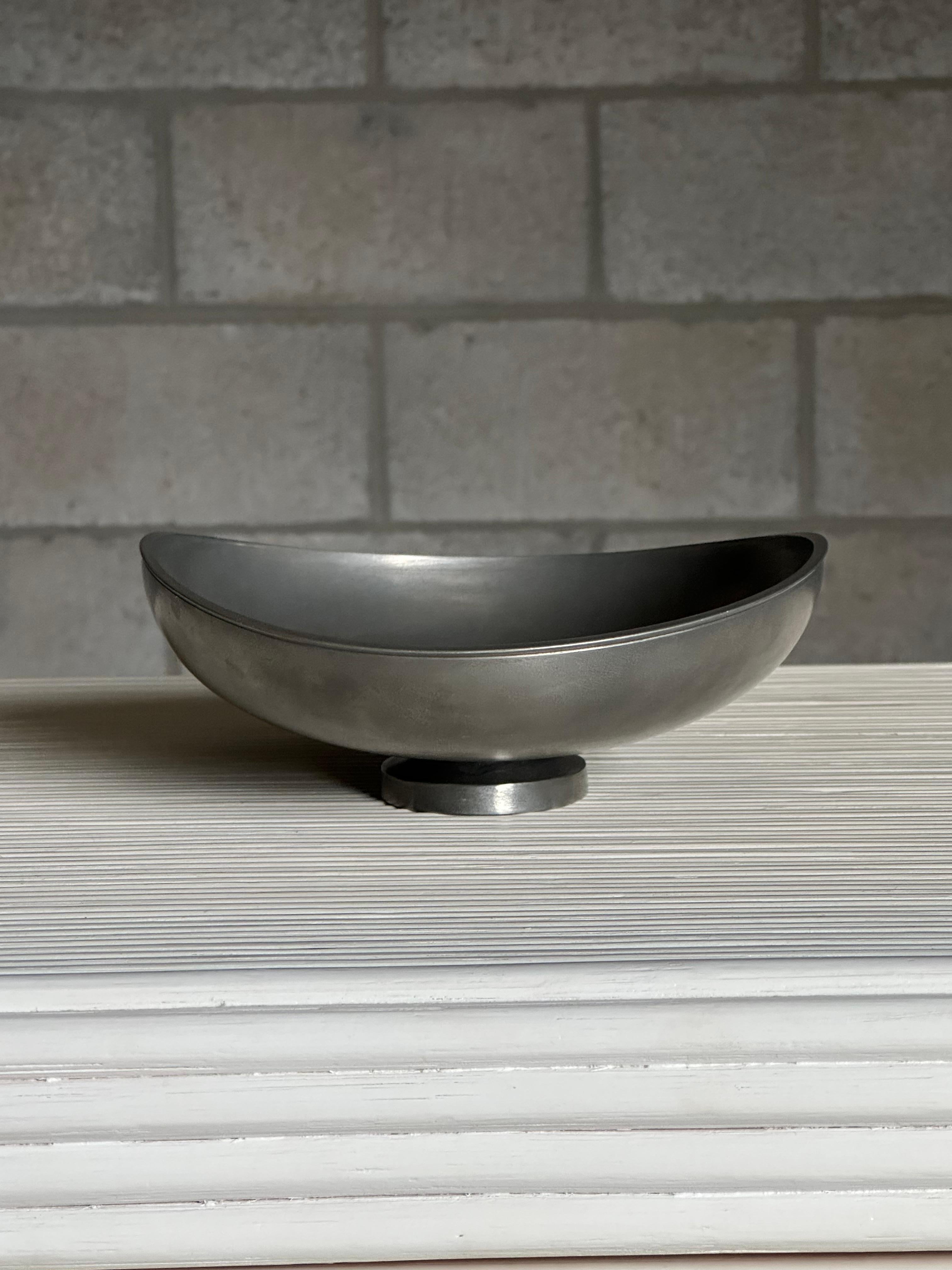 A wonderful Swedish modern organic shaped bowl by Edvin Oller for Schreuder & Olsson. Executed in Pewter and signed underneath with manufacturer impression. A Wonderful example

