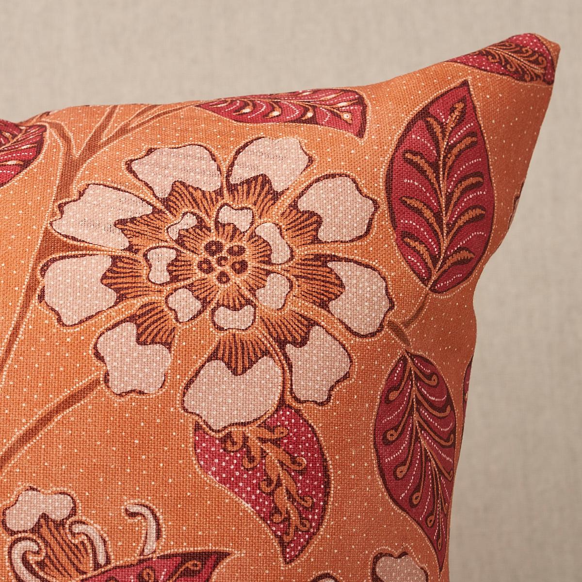 This pillow features Kava Cay Indoor/Outdoor with a knife edge finish. A loose, leafy floral inspired by a vintage batik, Kava Cay Indoor/Outdoor in mango is a beautifully detailed mid-scale pattern with the look of a traditional resist-dyed
