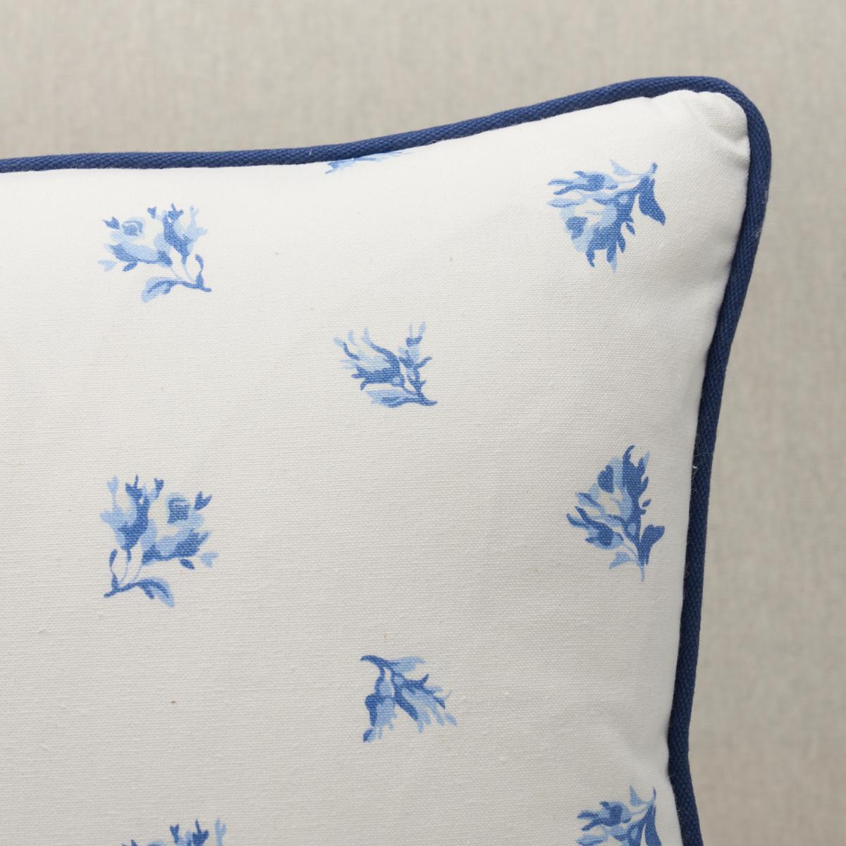 This pillow features Margie Floral. A classic delicate rosebud pattern inspired by a vintage design, Margie Floral in marigold is printed on a soft cotton-linen ground. Pillow is finished with a welt in Elliott Brushed Cotton. Welt contents: 100%
