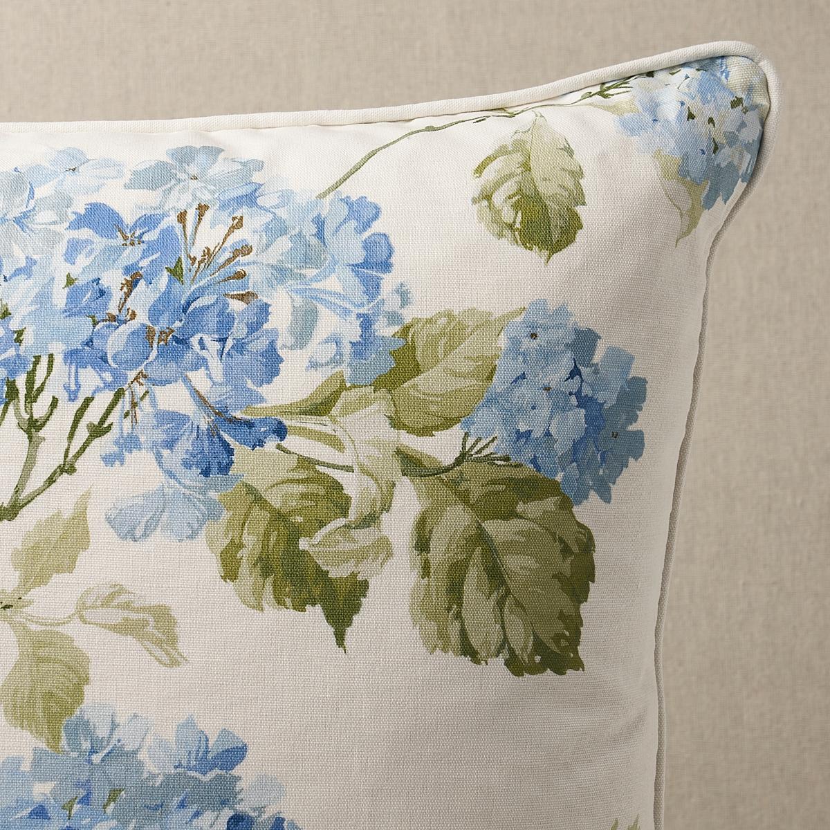 This pillow features Summer Hydrangea with a self welt finish. A classic floral with a painterly look, Summer Hydrangea in blue hydrangea is beautifully printed on a soft textured cotton-linen ground. Pillow includes a feather/down fill insert and