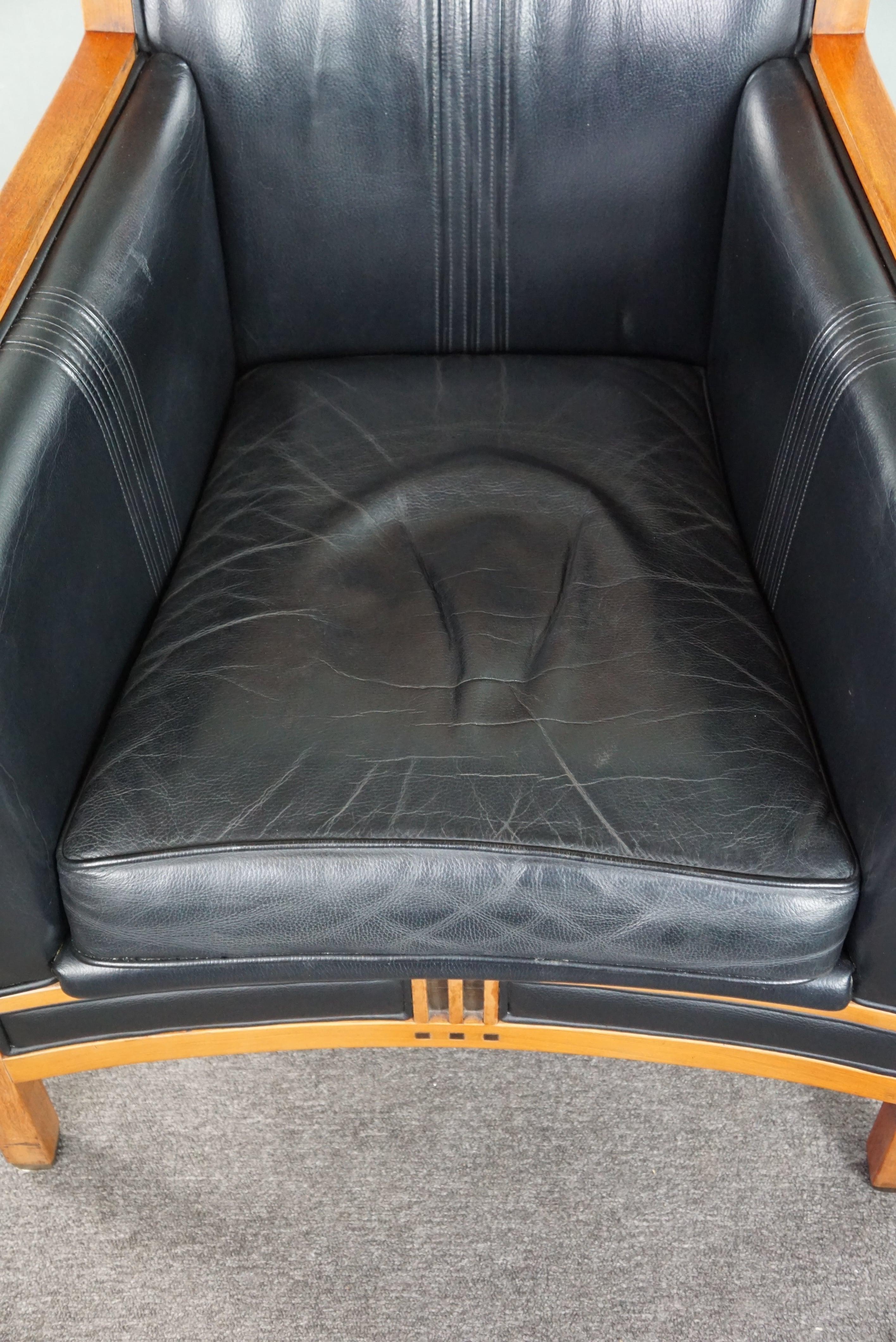 Leather Schuitema Decoforma Art Deco design black armchair with beautifull acccents For Sale