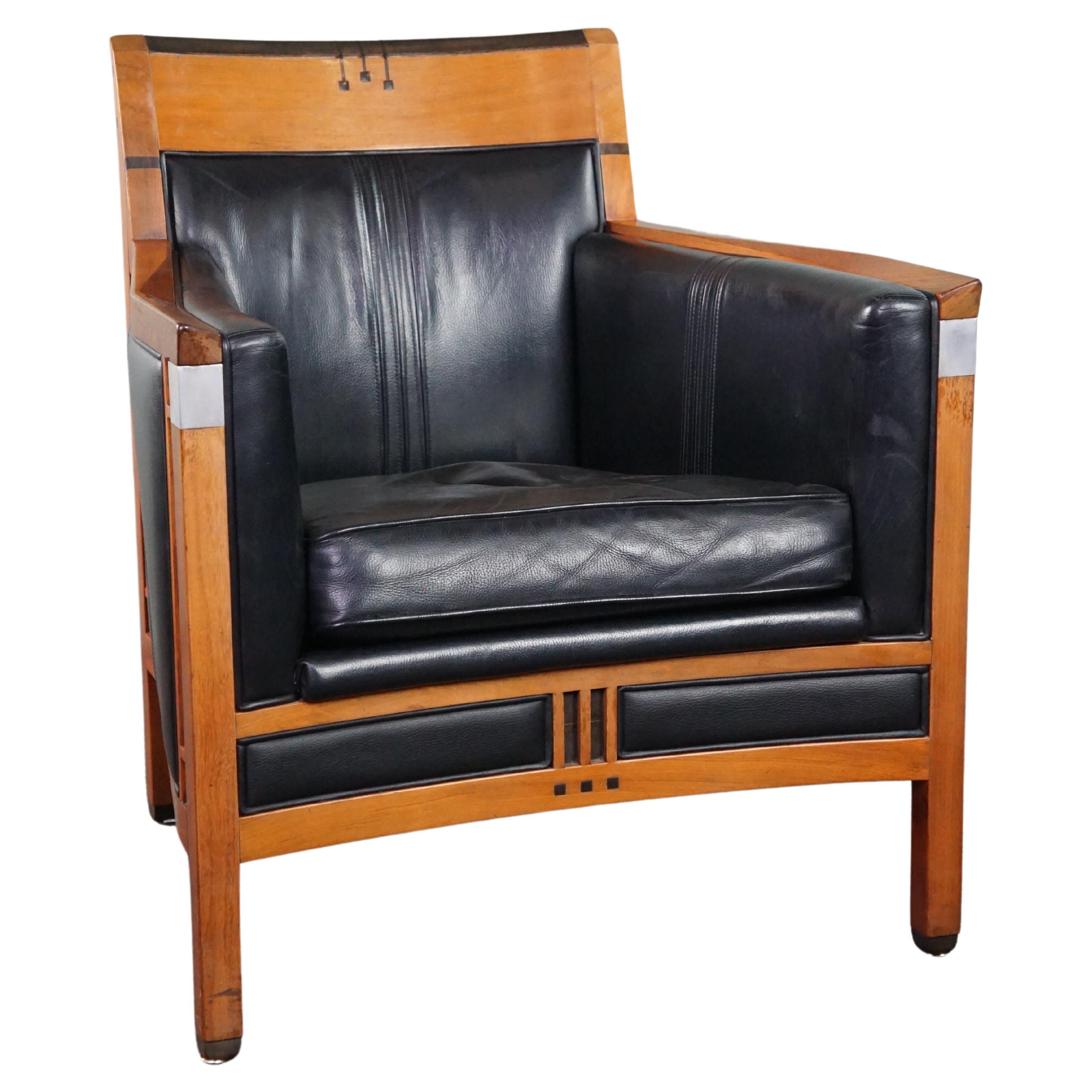 Schuitema Decoforma Art Deco design black armchair with beautifull acccents For Sale