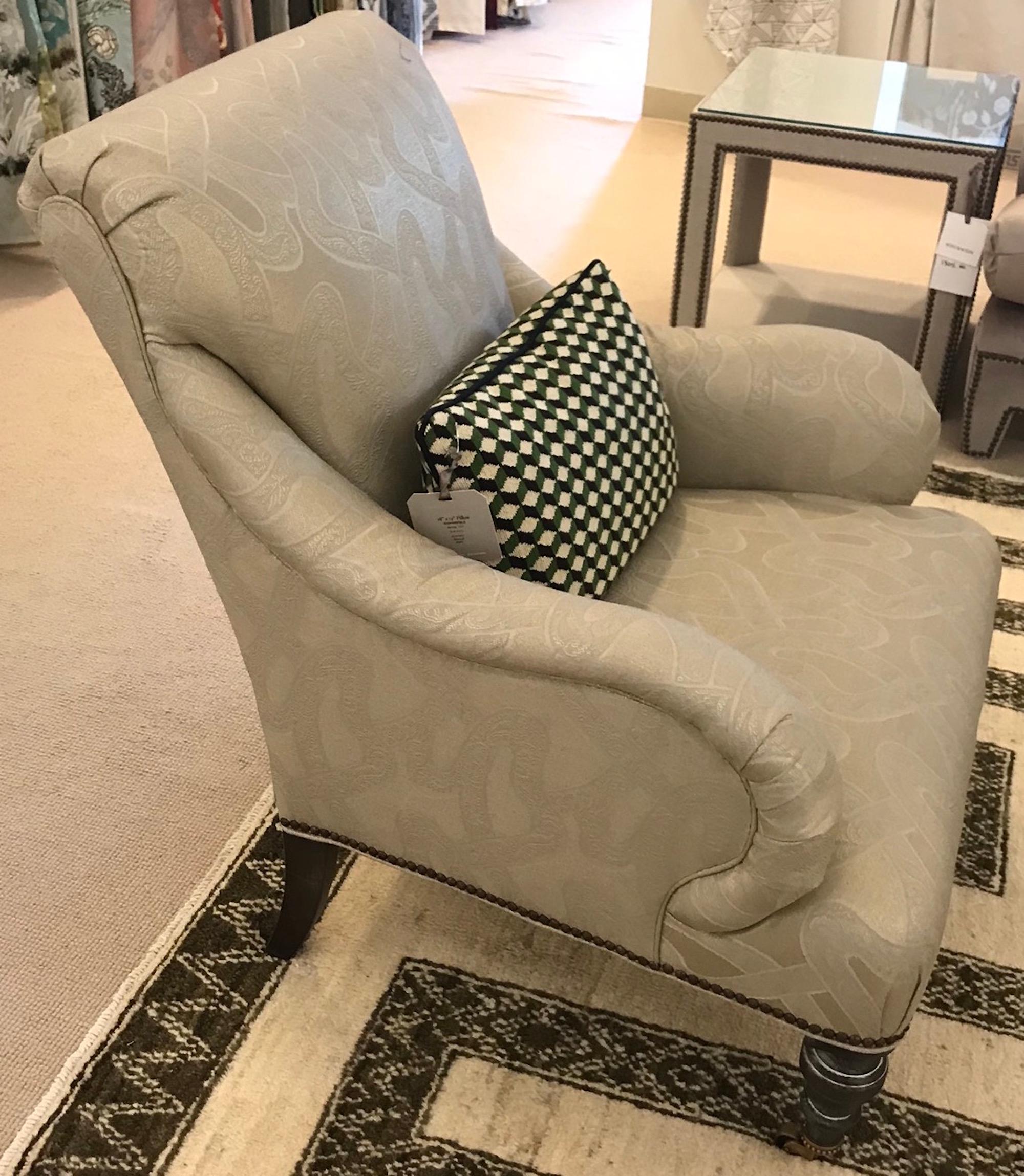 This striking Schumacher Albert chair is upholstered with our Chantilly fabric in a vermeil color way. The organic swirls and curves that define Chantilly are based on the intricate loops of the French region's famed lace. It is an elegant woven