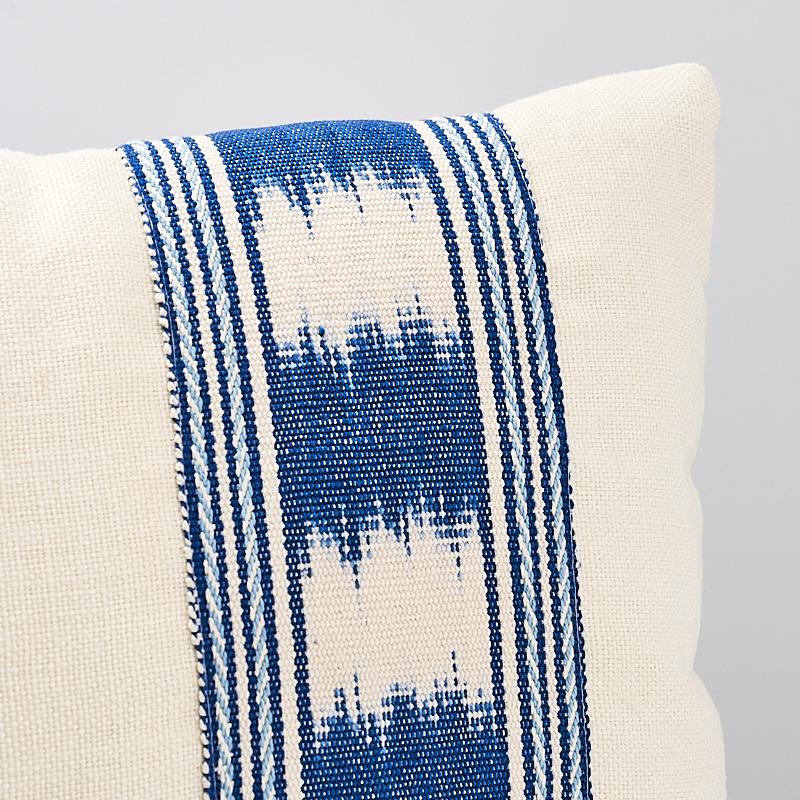 This pillow features Banyon Ikat Tape with a knife edge finish. A warp-printed ikat woven by hand, this layered, pattern-on-pattern tape features a striped edging and incredible dimension. Body of pillow is Piet Performance Linen. Pillow includes a