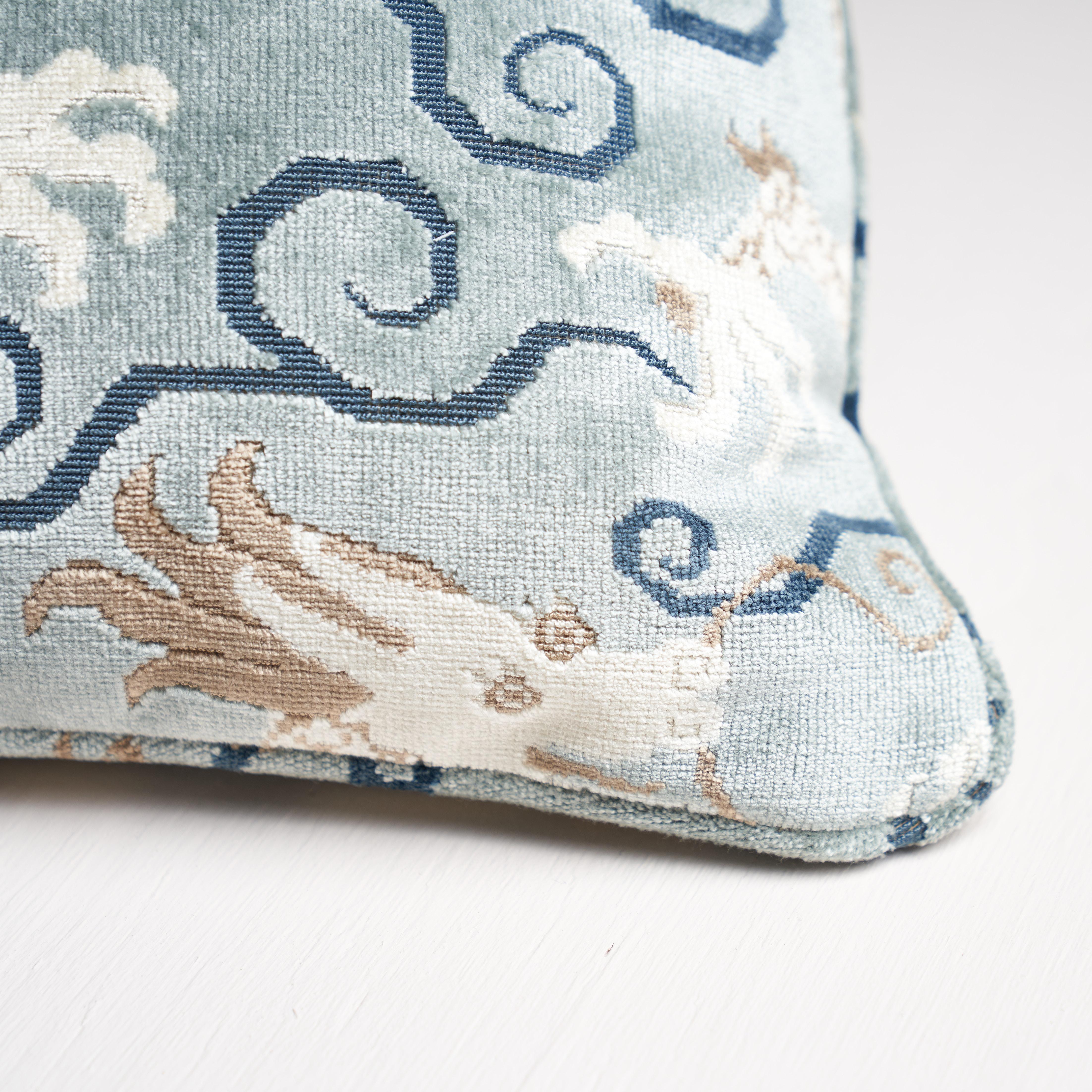 This pillow features Bixi Velvet with a self-welt finish. Inspired by chinoiserie motifs, this fabulous, fantastical dragon pattern was dreamt up by our in-house design studio. Dense pile and loop accents create a rich, textural allure. Pillow