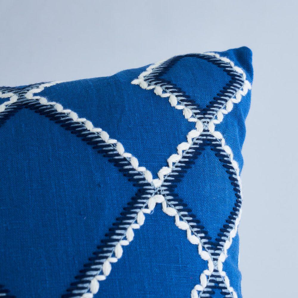 This pillow features Branson Embroidery with a knife edge finish. This geometric textile is a play on an argyle and features an embroidered pattern with rickrack-ish edging. Pillow includes a feather/down fill insert and hidden zipper closure.

*If