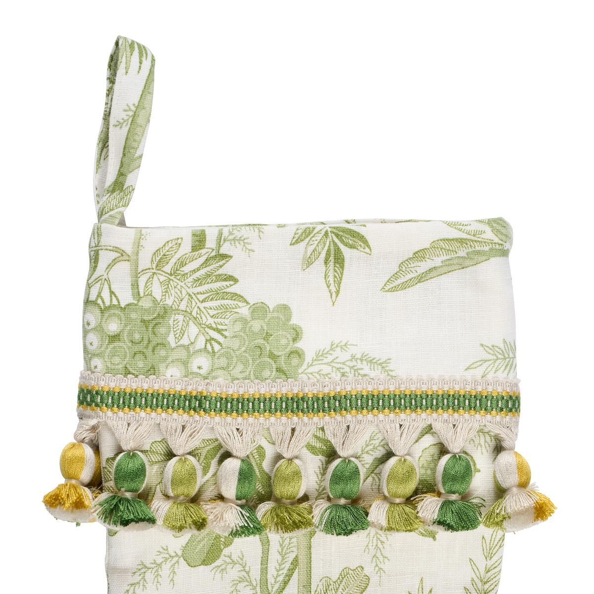 Pre-order for November delivery. Featuring Schumacher’s ever-popular Pomegranate Print in a soft olive-green hue and trimmed with snow-white tassel fringe, this limited-edition holiday stocking offers a subtle and sophisticated nod to seasonal
