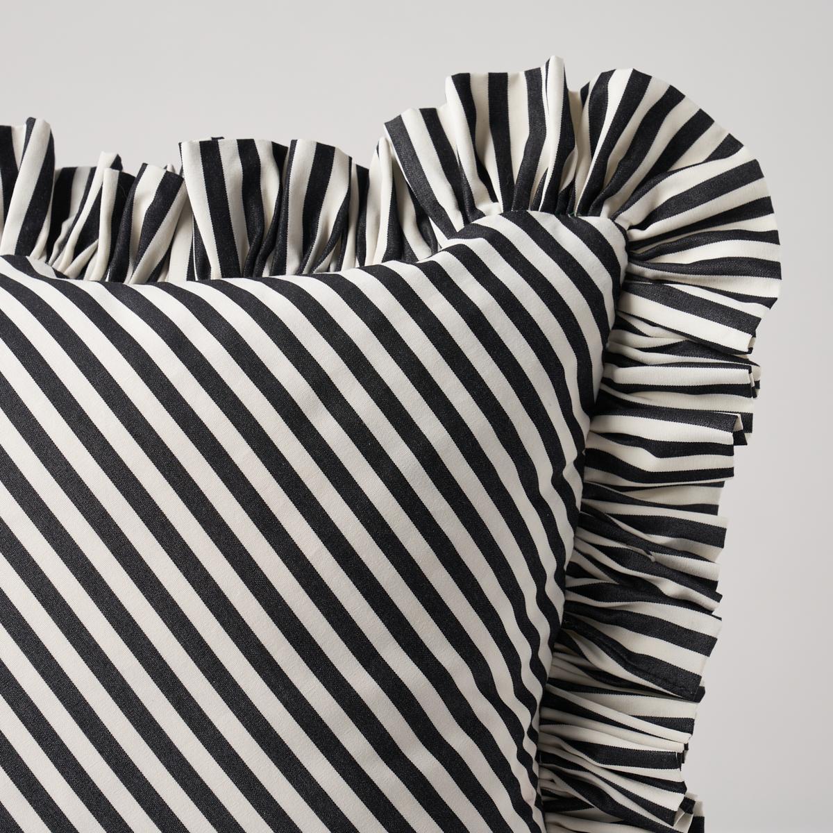 This pillow features Brigitte Stripe with a 1.5