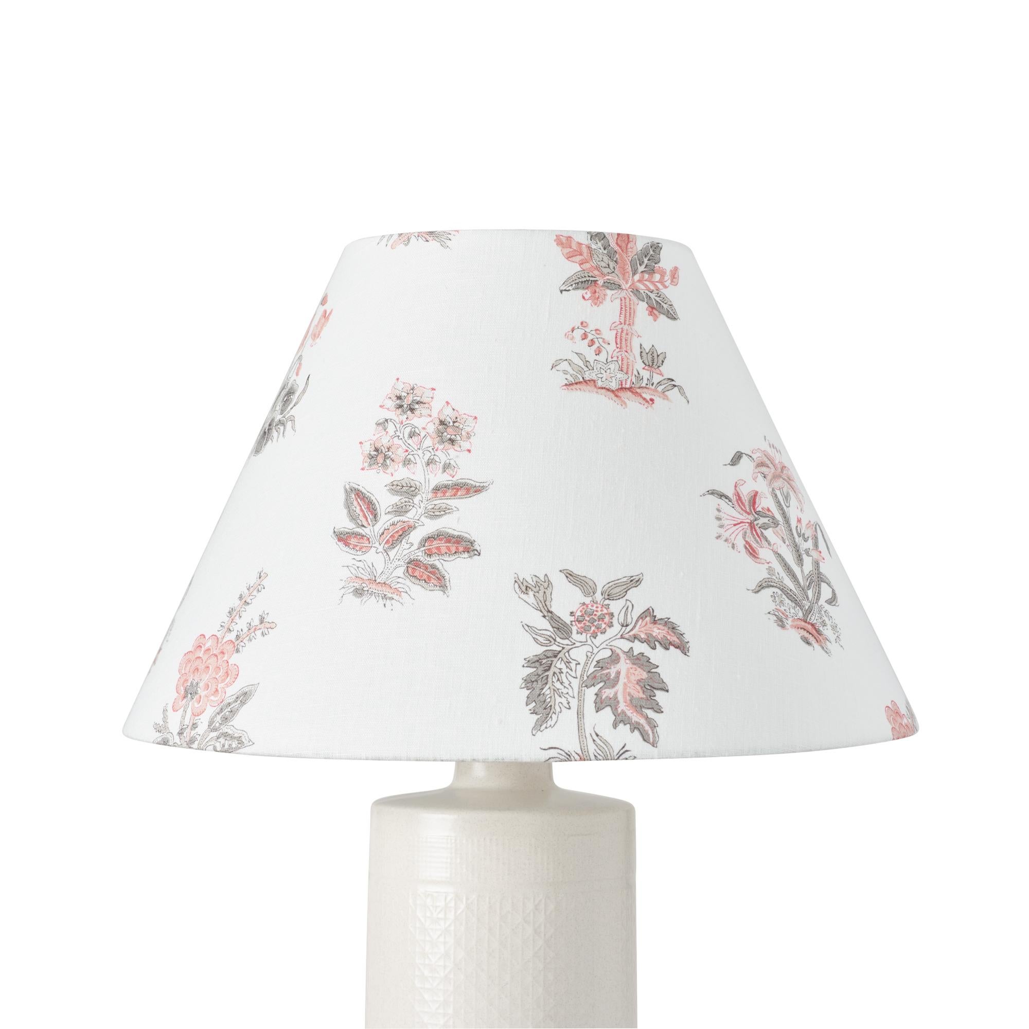 This lampshade features our Bunny pattern in Rose. Based on 18th century floral studies, Bunny is hand printed for a romantic old-world feel. It's scaled and colored for remarkable versatility. Measures: 8