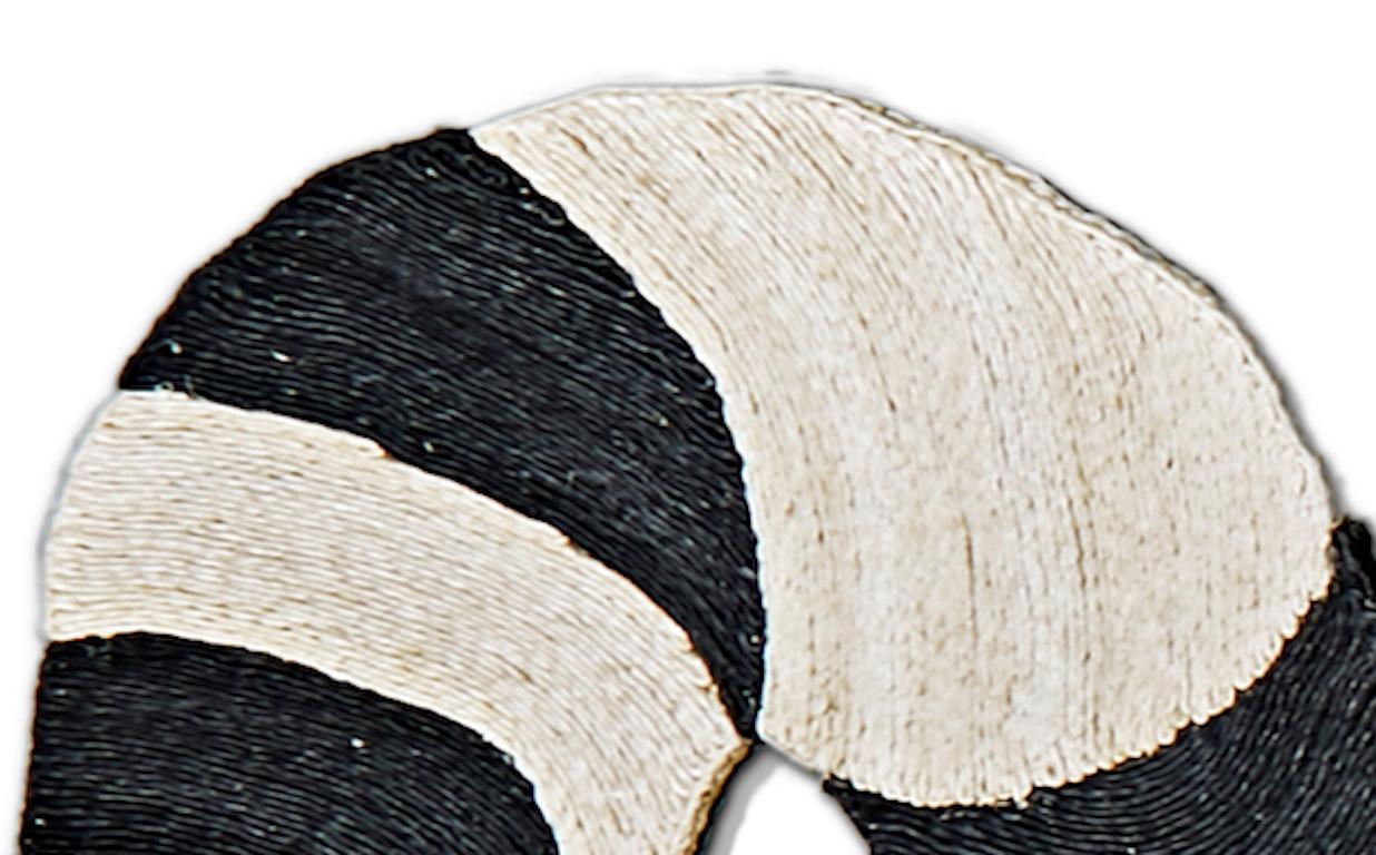 snake shaped rug