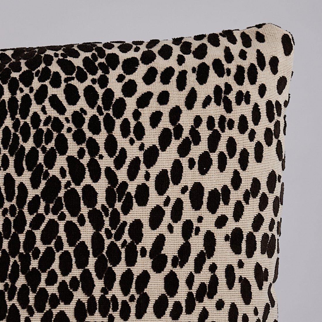 This pillow features Cheetah Velvet with a knife edge finish. A small-scale design with a big repeat, this wildly chic, cut velvet animal pattern stands out against a looped ground. Pillow includes a feather/down fill insert and hidden zipper