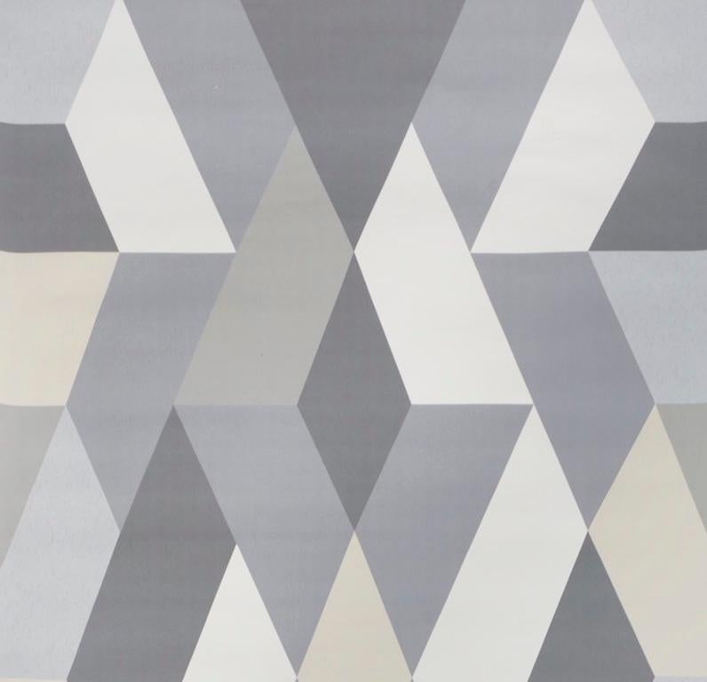 A modernist collage of geometric shapes, this extra-large wallpaper design creates a striking, mural-like effect. It is packaged as two 12’ panels.

Since Schumacher was founded in 1889, our family-owned company has been synonymous with style,