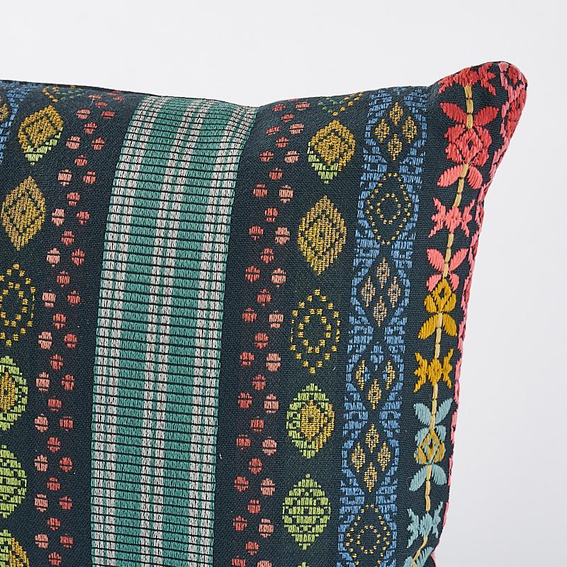 This pillow features Cosima Embroidery with a knife edge finish. Motifs that are woven and then embroidered give this elaborate, multicolored vertical stripe the look of an authentic heirloom fabric with a rich, layered feel. Pillow includes a