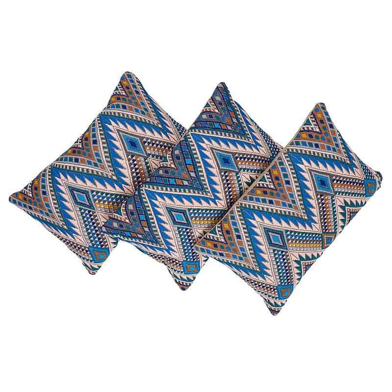 This pillow features Coyolate (Item# 79240, COYOLATE HAND WOVEN BROCADE Fabric) with a knife edge finish. This extraordinary 39‚Äù-long brocade panel is hand-woven and -embroidered on a backstrap loom by master Maya women weavers in Guatemala. The