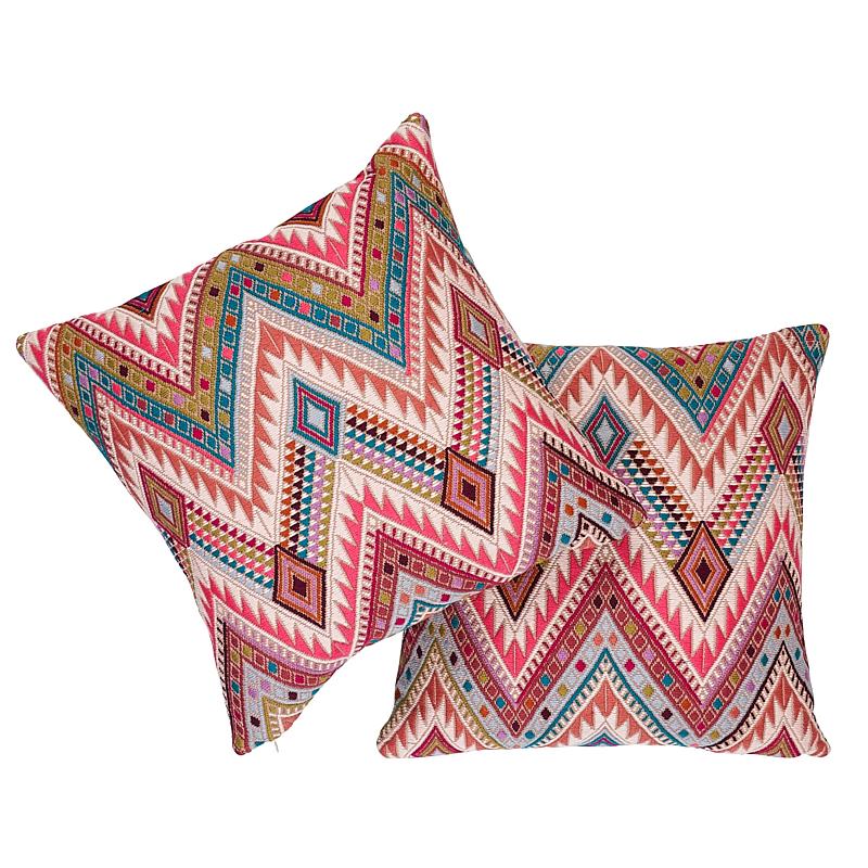 This pillow features Coyolate (Item# 79241, COYOLATE HAND WOVEN BROCADE Fabric) with a knife edge finish. This extraordinary 39‚Äù-long brocade panel is hand-woven and -embroidered on a backstrap loom by master Maya women weavers in Guatemala. The