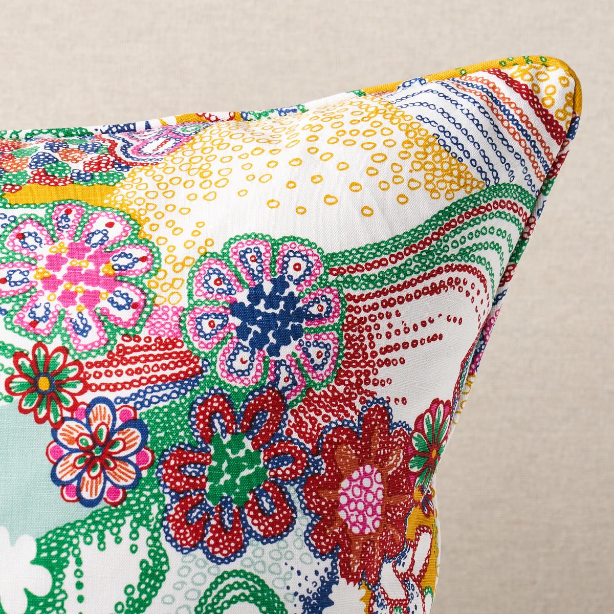 This pillow features Daisy Chain by Clements Ribeiro for Schumacher with a self welt finish. London-based fashion duo Clements Ribeiro created Daisy Chain in primary multi in homage to a vintage 1970s print that instantly transported them to their