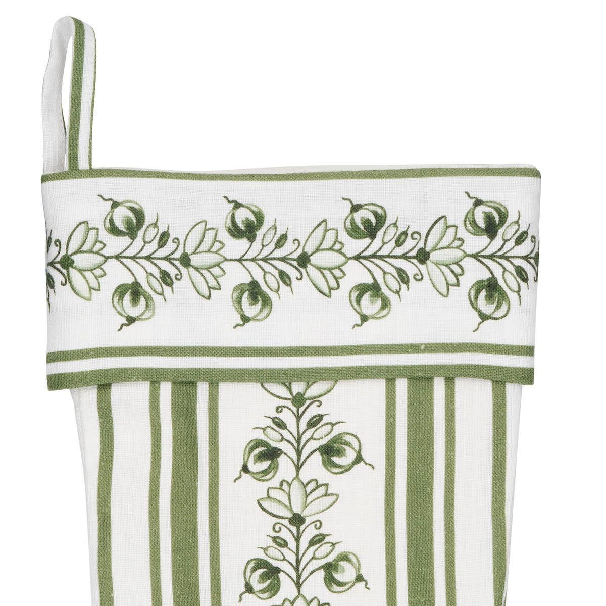 *Pre-order, available to ship in October.

Garlanded with softly stylized flowers and festively striped, this limited-edition holiday stocking is fashioned out of Schumacher’s Delft Stripe, an Italian linen fabric designed by Marie-Anne Oudejans.