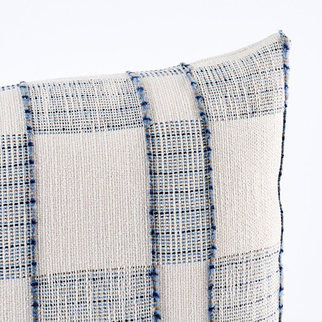 This pillow features Elko Plaid with a knife edge finish. The asymmetrical design and unexpected fringe detailing shows the hand of the maker in this plaid. Pillow includes a feather/down fill insert and hidden zipper closure.

*If out of stock,