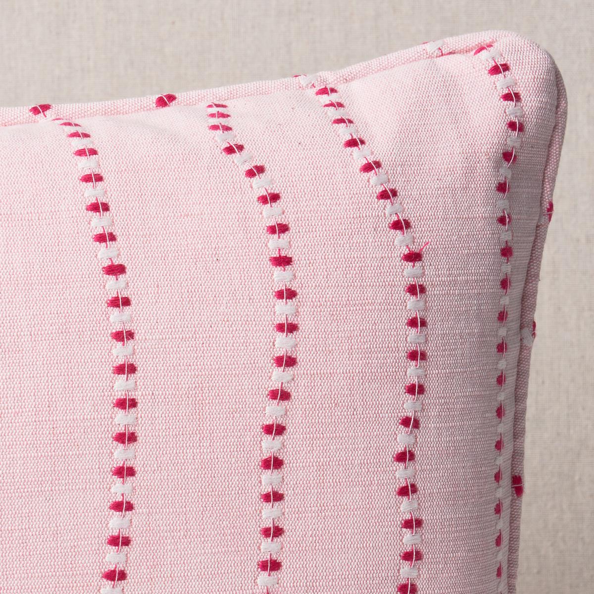 This pillow features Elodie Embroidery with a self welt finish. The wavy lines stitched in alternating thread colors make Elodie Embroidery in rose a uniquely rhythmic alternative to a conventional stripe. Pillow includes a feather/down fill insert